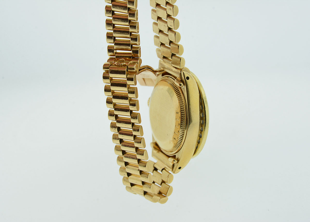 Women's Rolex with Diamond Bezel and Mother-of-Pearl and Diamond Dial