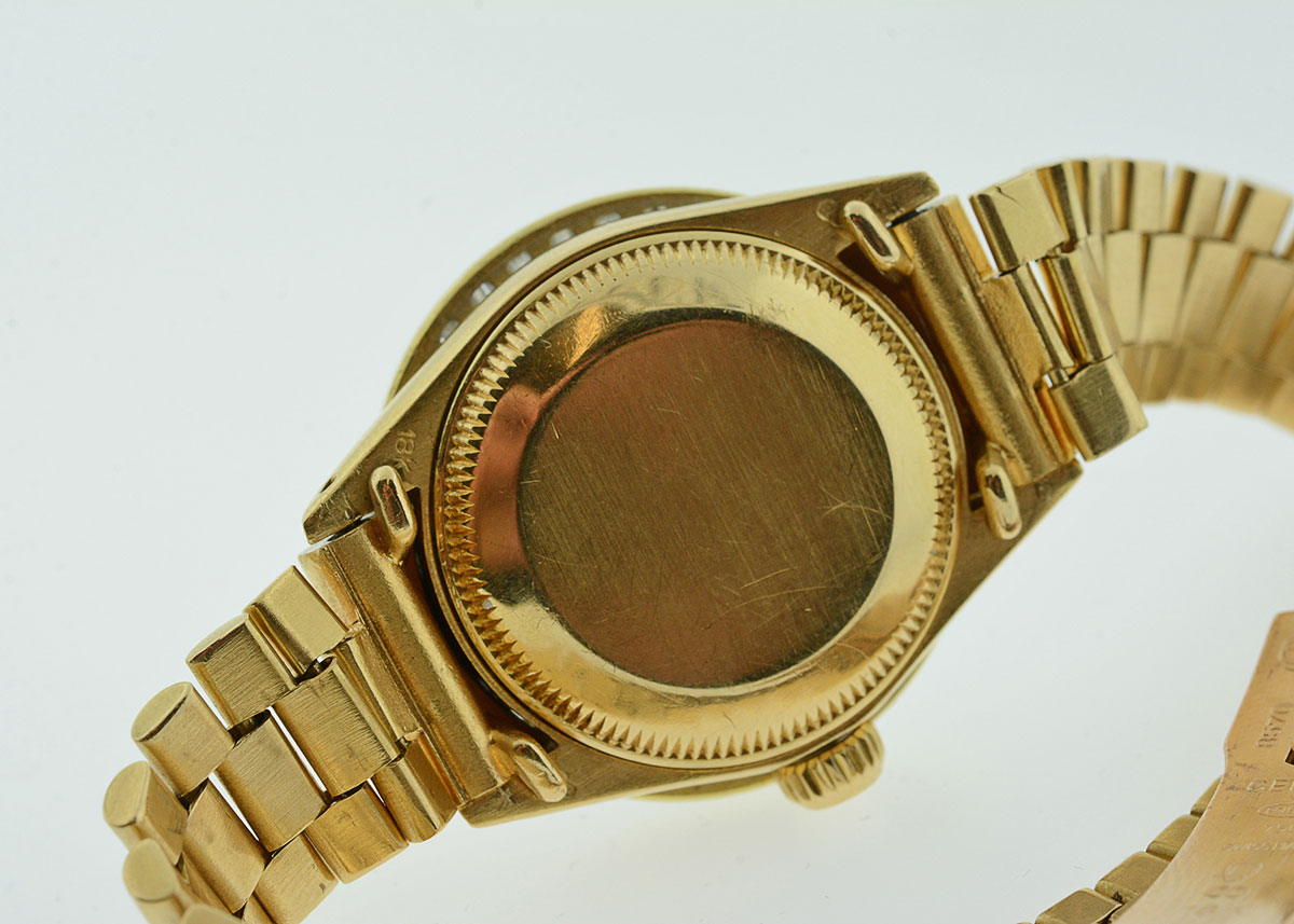 Women's Rolex with Diamond Bezel and Mother-of-Pearl and Diamond Dial