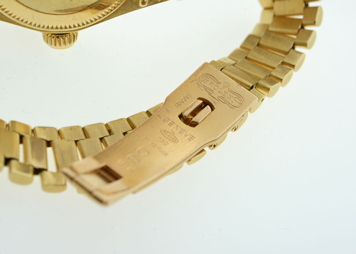 Women's Rolex with Diamond Bezel and Mother-of-Pearl and Diamond Dial