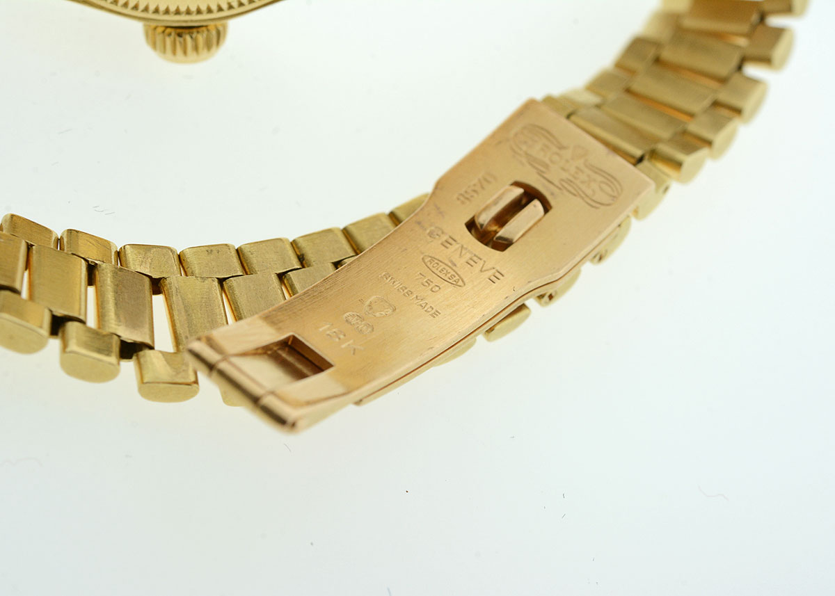 Women's Rolex with Diamond Bezel and Mother-of-Pearl and Diamond Dial