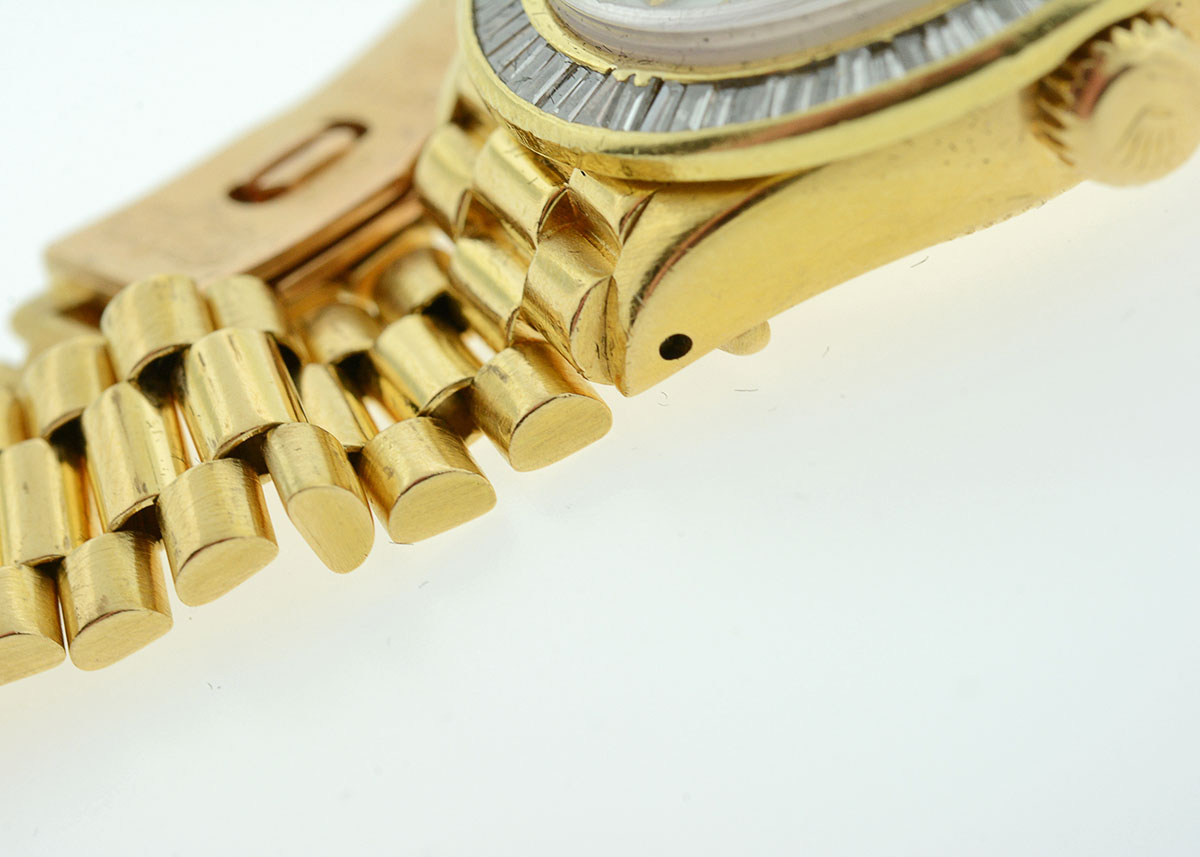 Women's Rolex with Diamond Bezel and Mother-of-Pearl and Diamond Dial