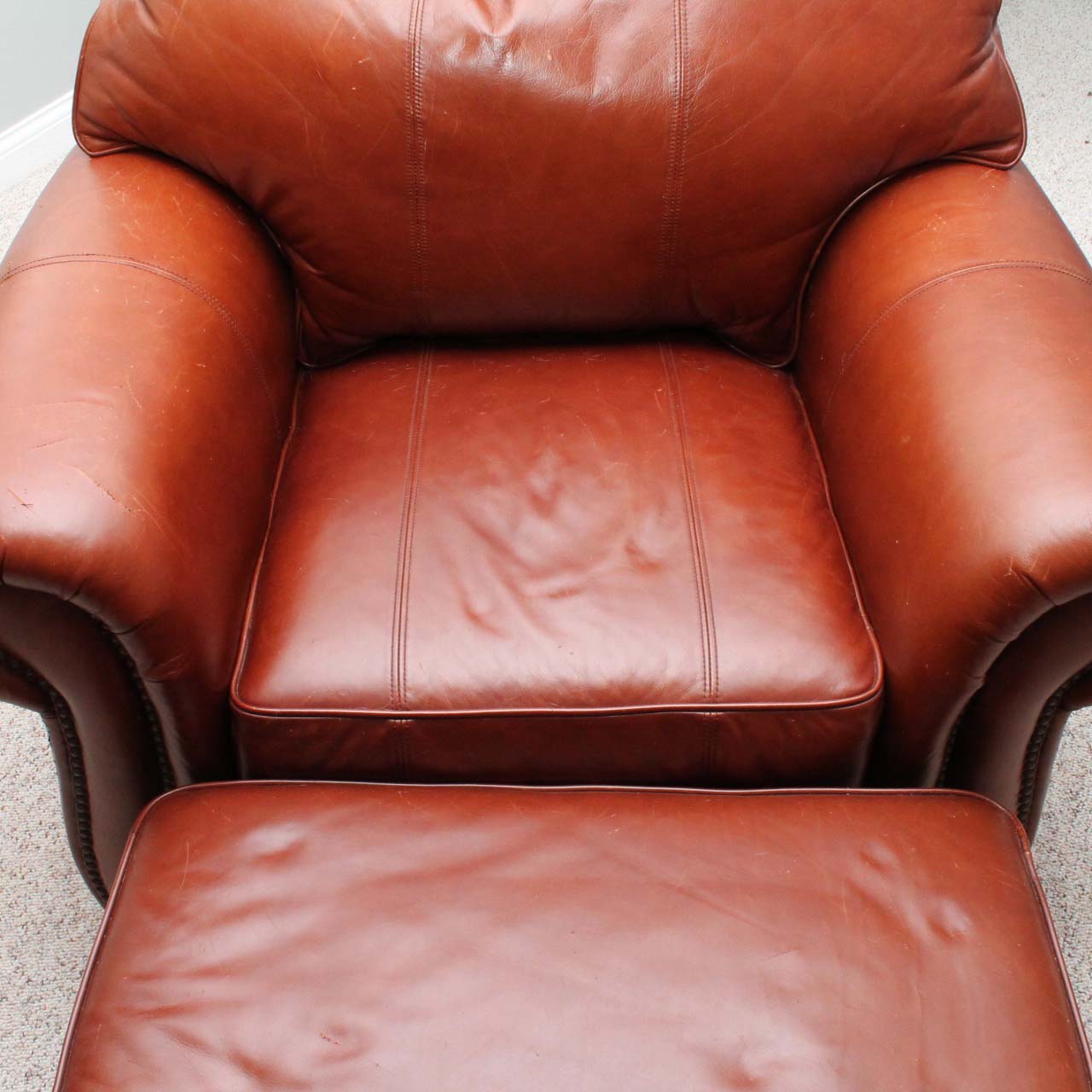 Thomasville Brown Leather Chair and Ottoman