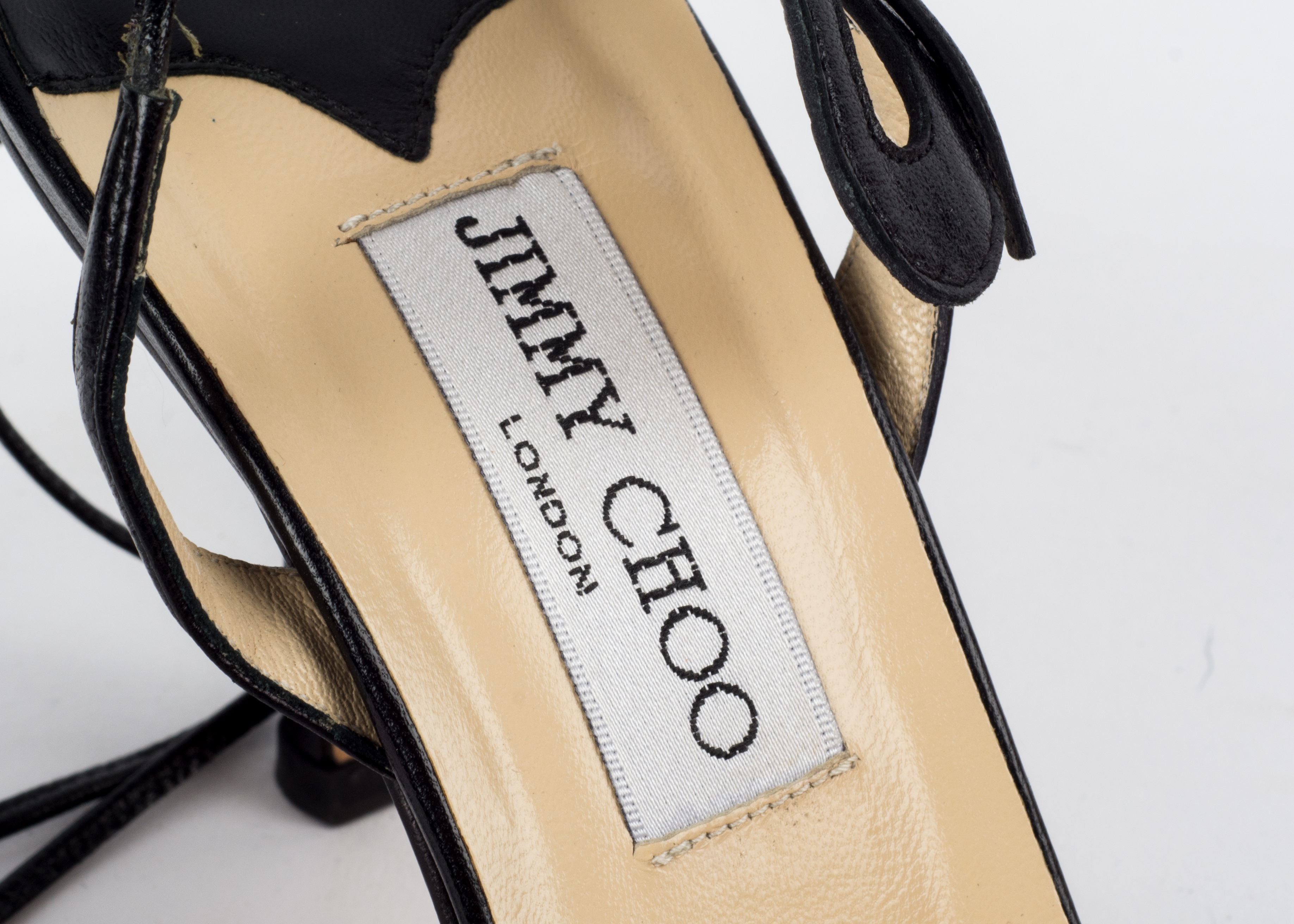 Four Pairs of Jimmy Choo, Prada and Miu Miu Shoes