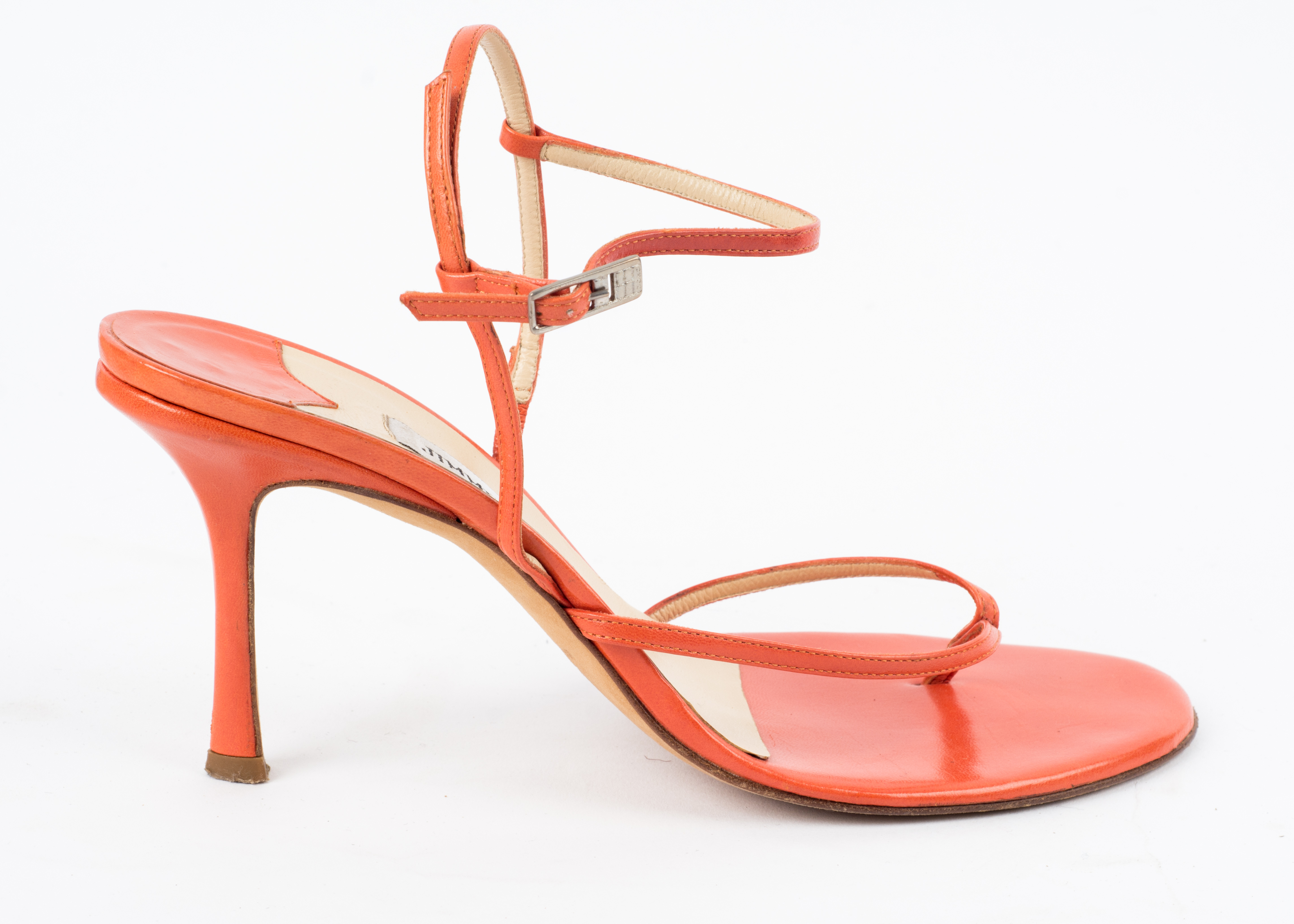 Four Pairs of Jimmy Choo, Prada and Miu Miu Shoes