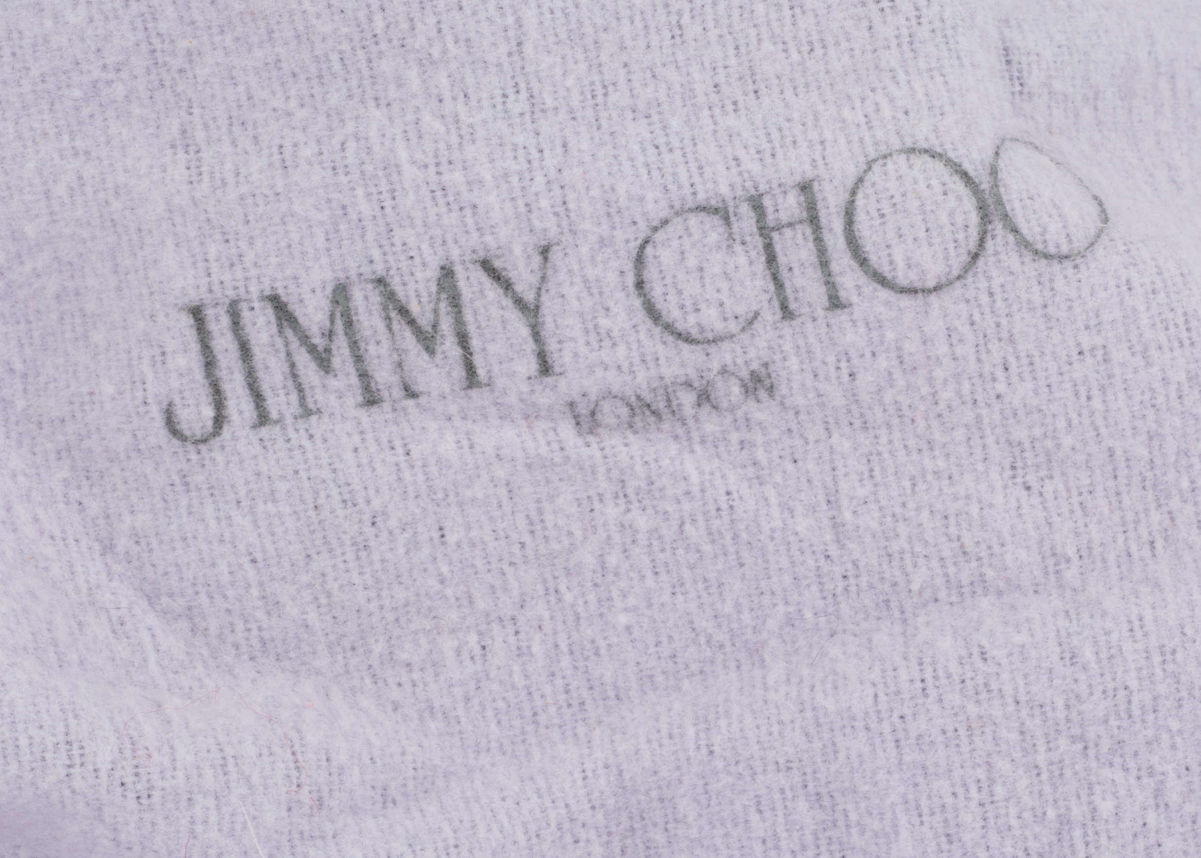 Four Pairs of Jimmy Choo, Prada and Miu Miu Shoes