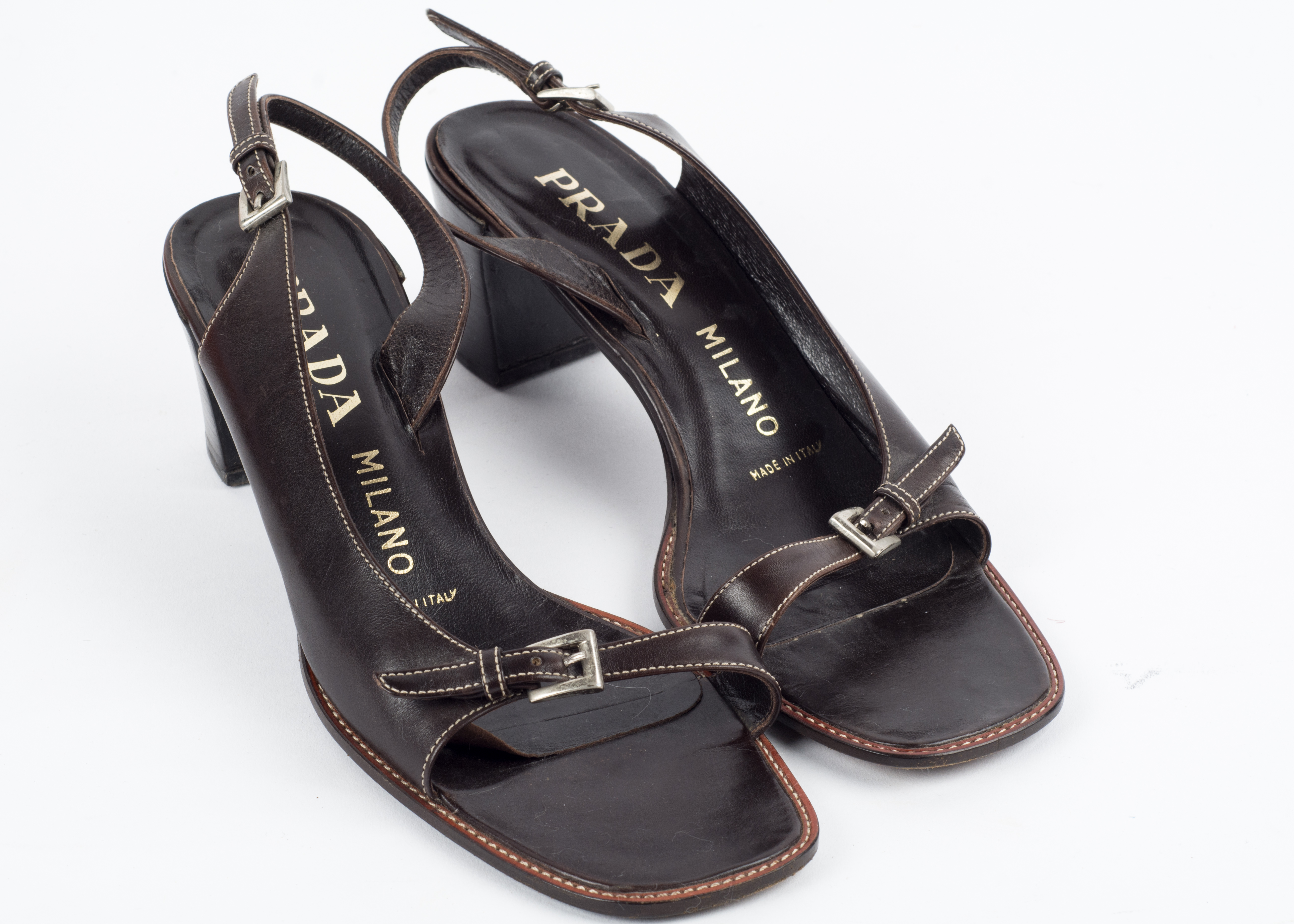 Four Pairs of Jimmy Choo, Prada and Miu Miu Shoes