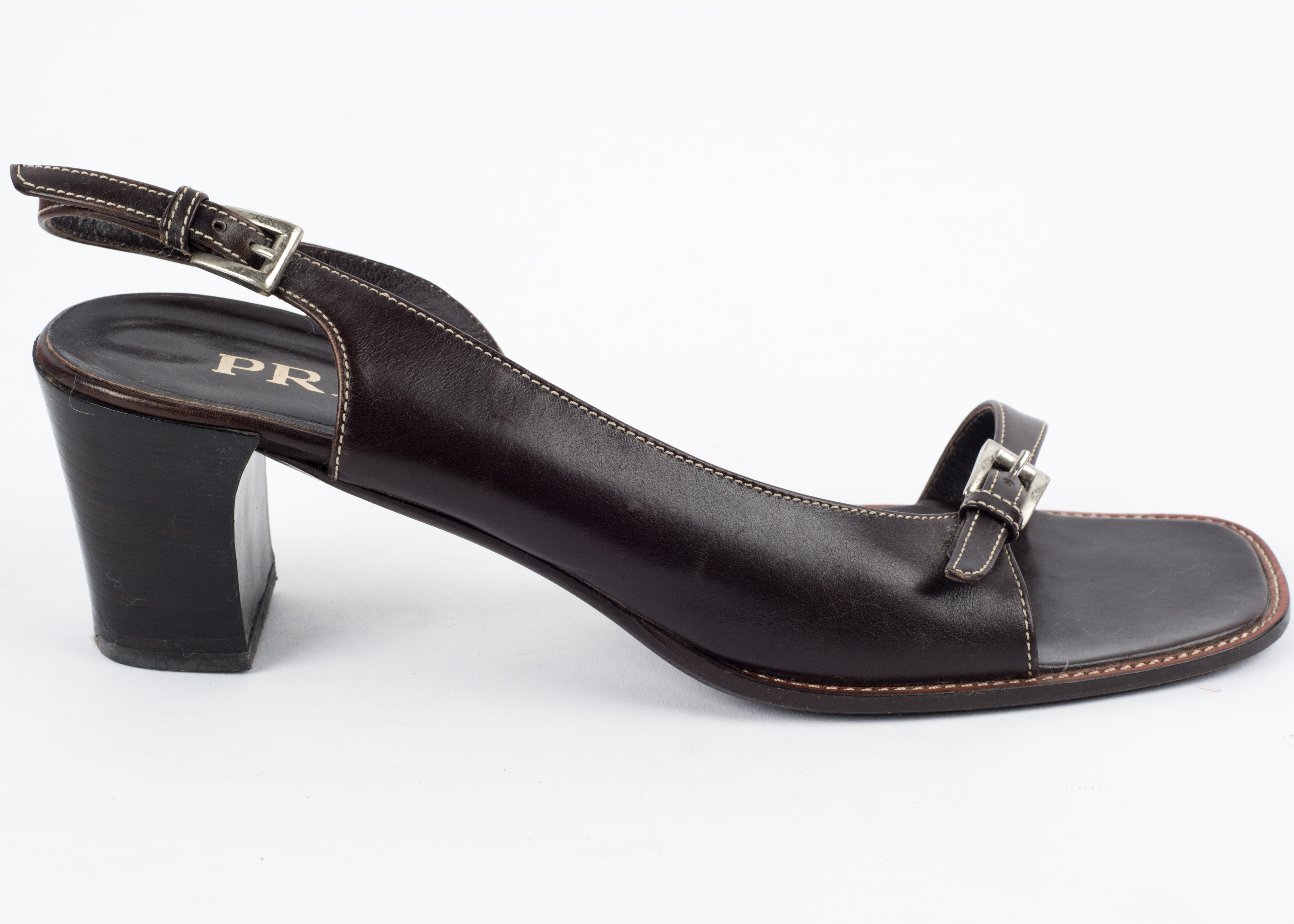 Four Pairs of Jimmy Choo, Prada and Miu Miu Shoes