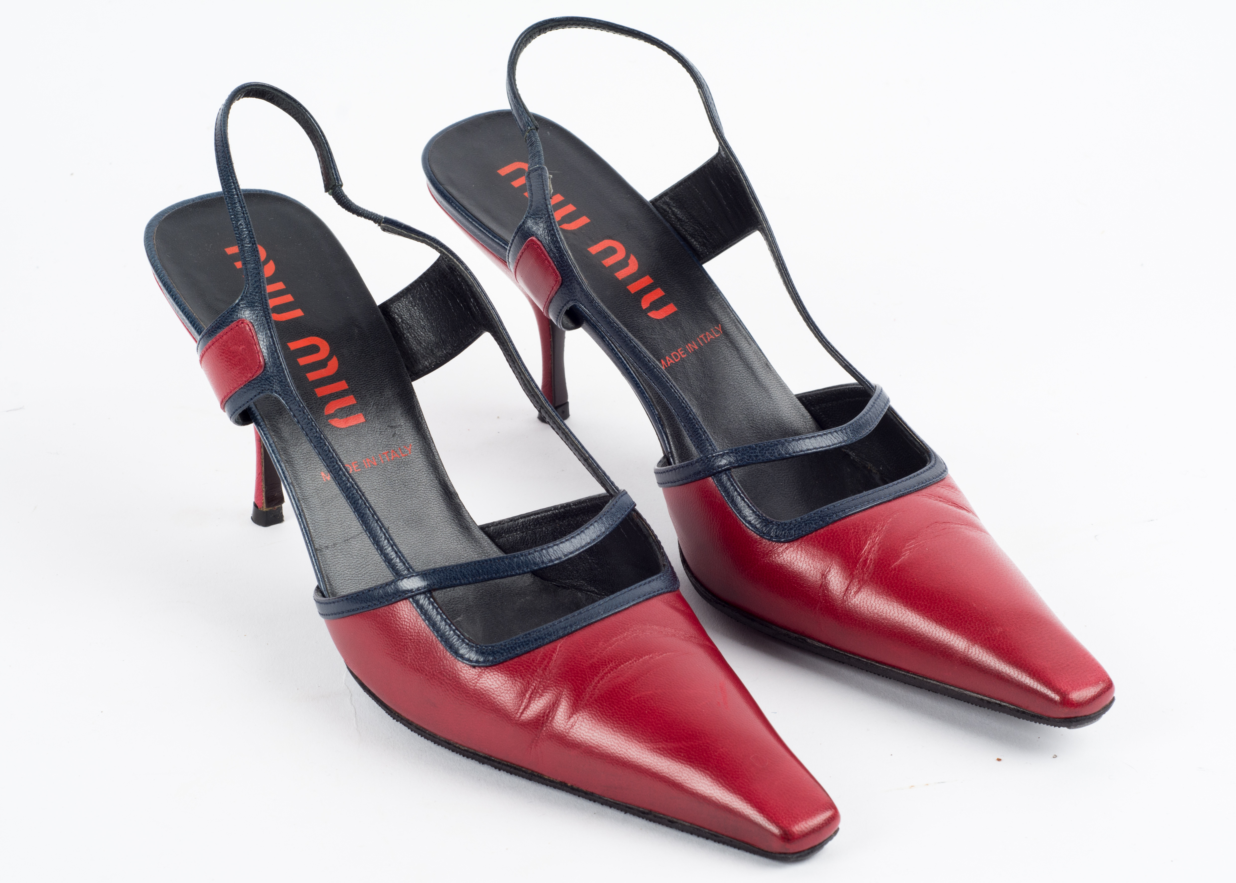 Four Pairs of Jimmy Choo, Prada and Miu Miu Shoes