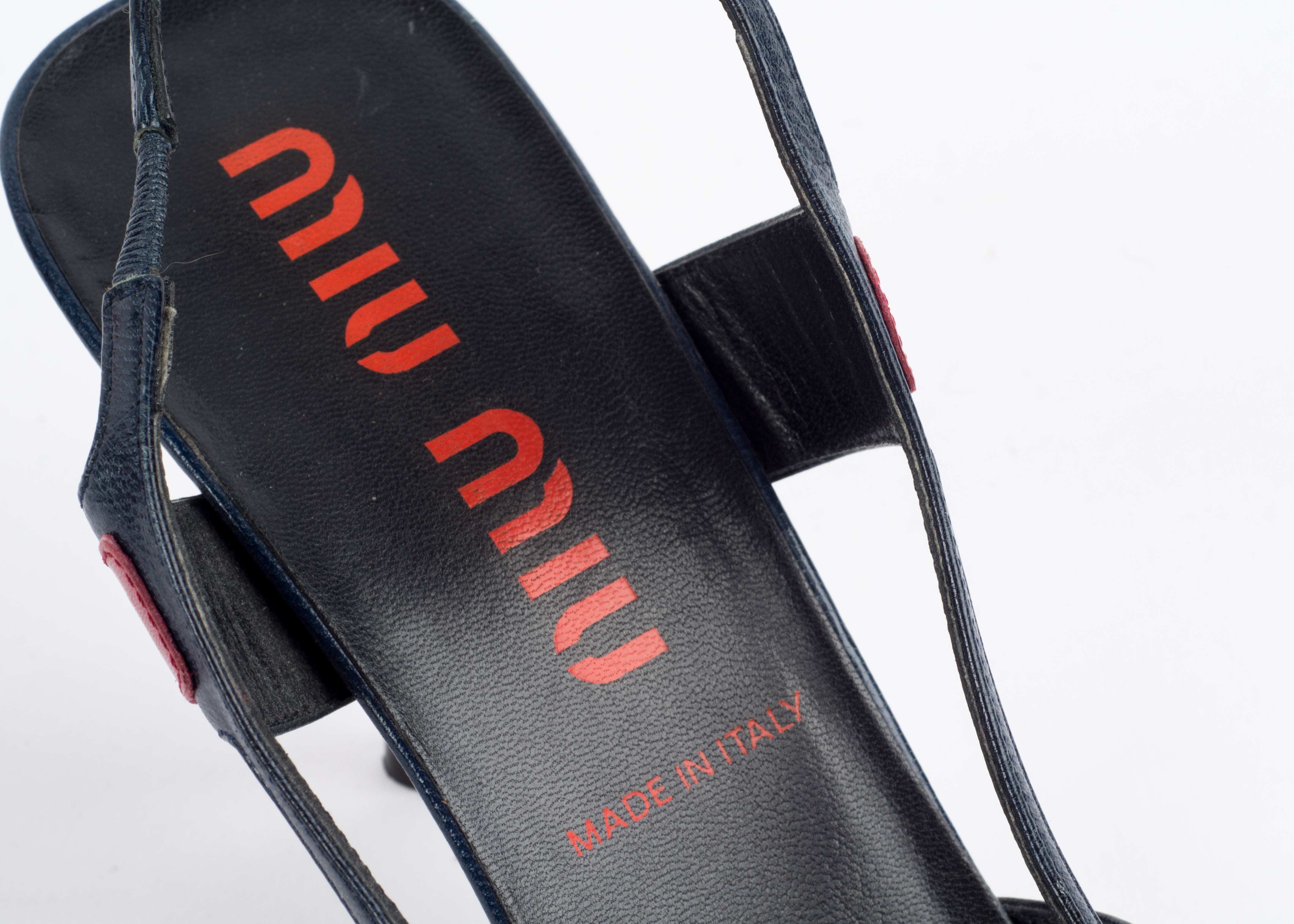 Four Pairs of Jimmy Choo, Prada and Miu Miu Shoes