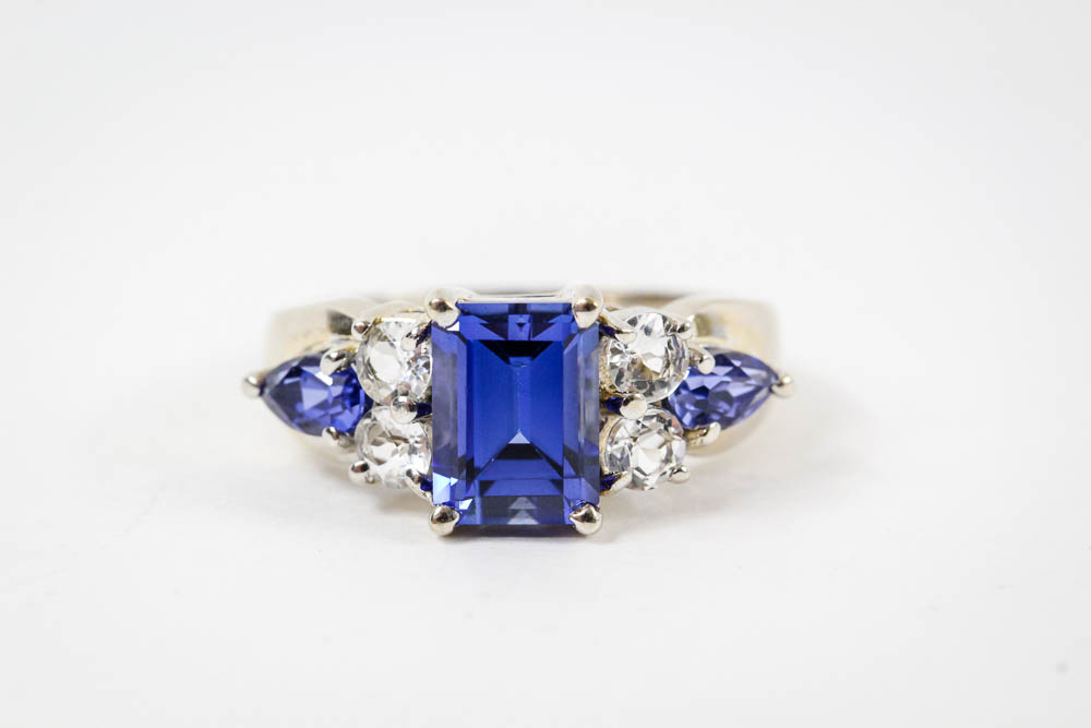 10K White Gold Blue Sapphire and White Topaz Ring