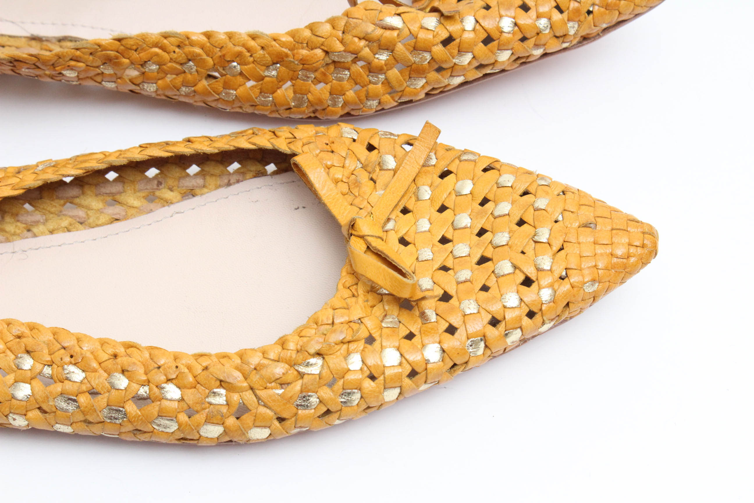 Designer Flats Featuring Prada and Tory Burch