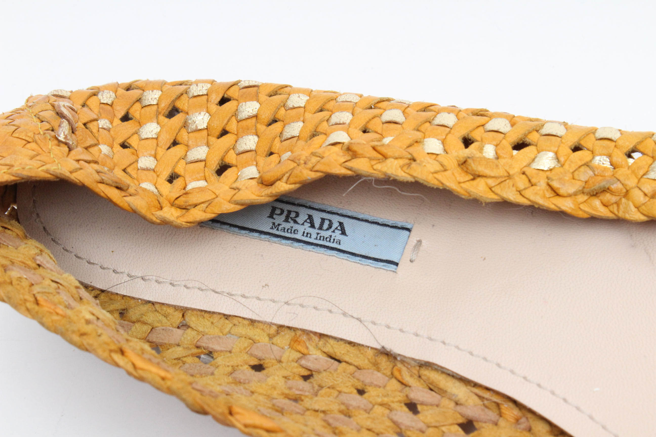Designer Flats Featuring Prada and Tory Burch