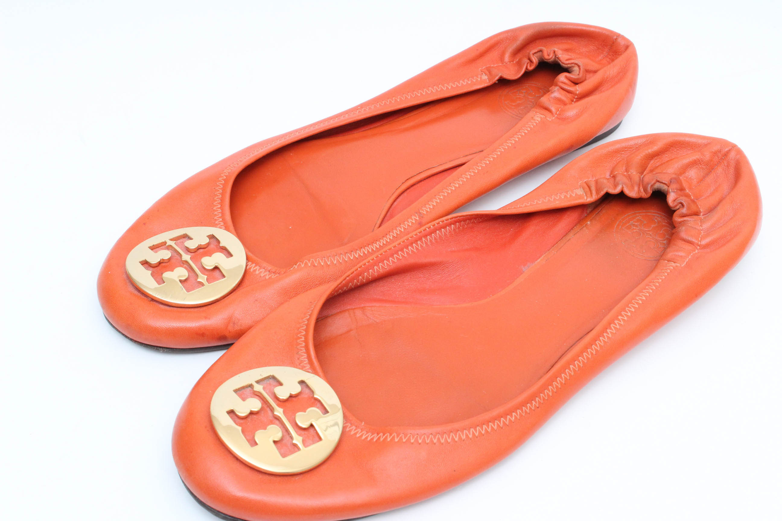 Designer Flats Featuring Prada and Tory Burch
