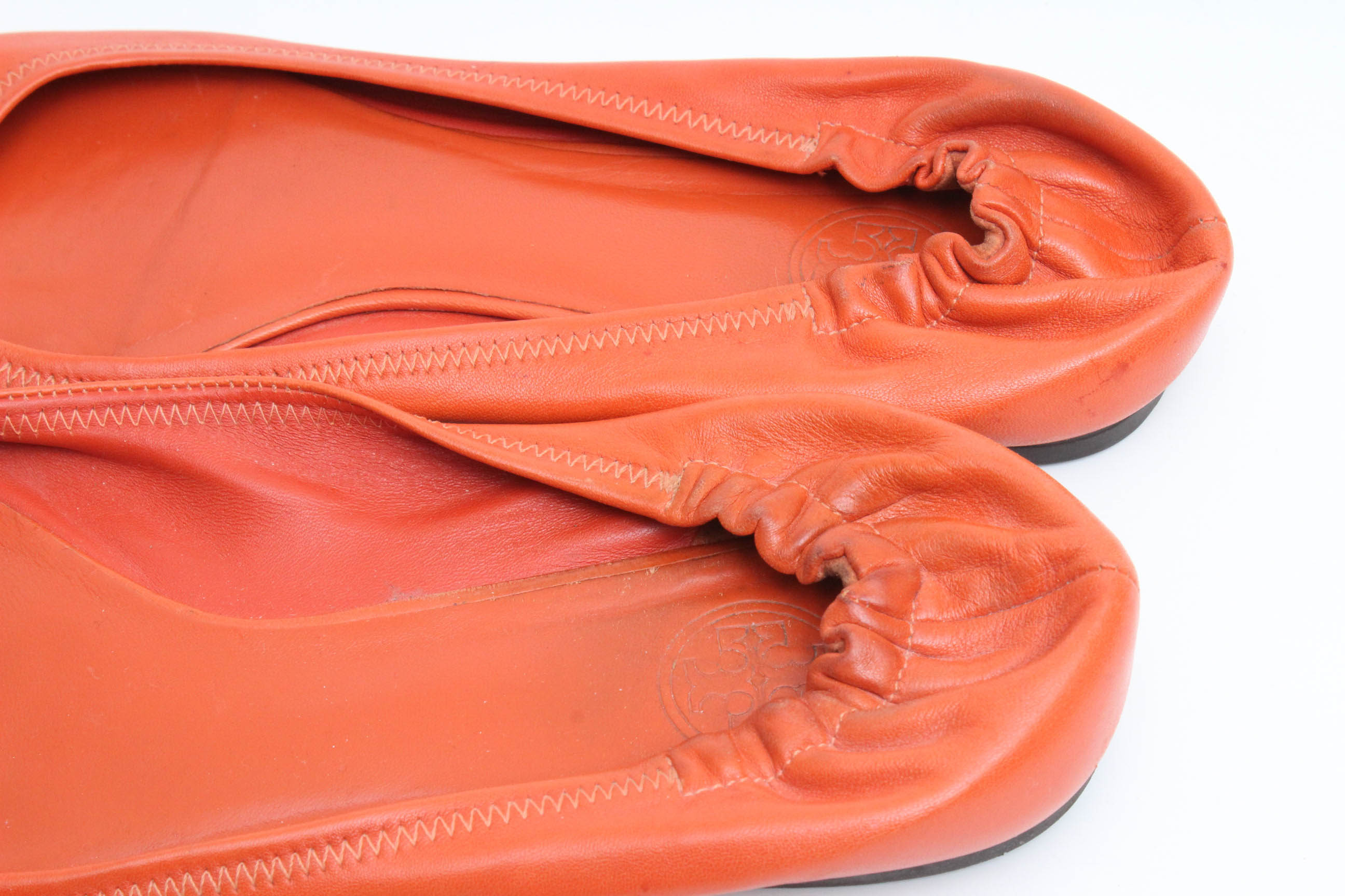 Designer Flats Featuring Prada and Tory Burch