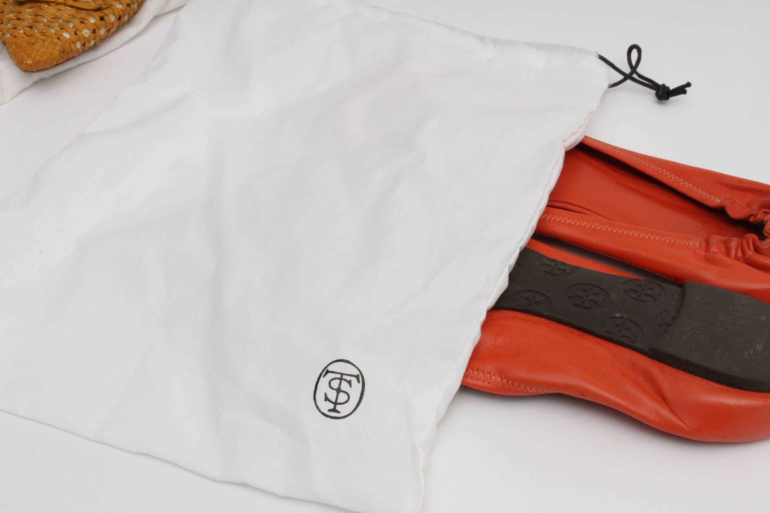 Designer Flats Featuring Prada and Tory Burch