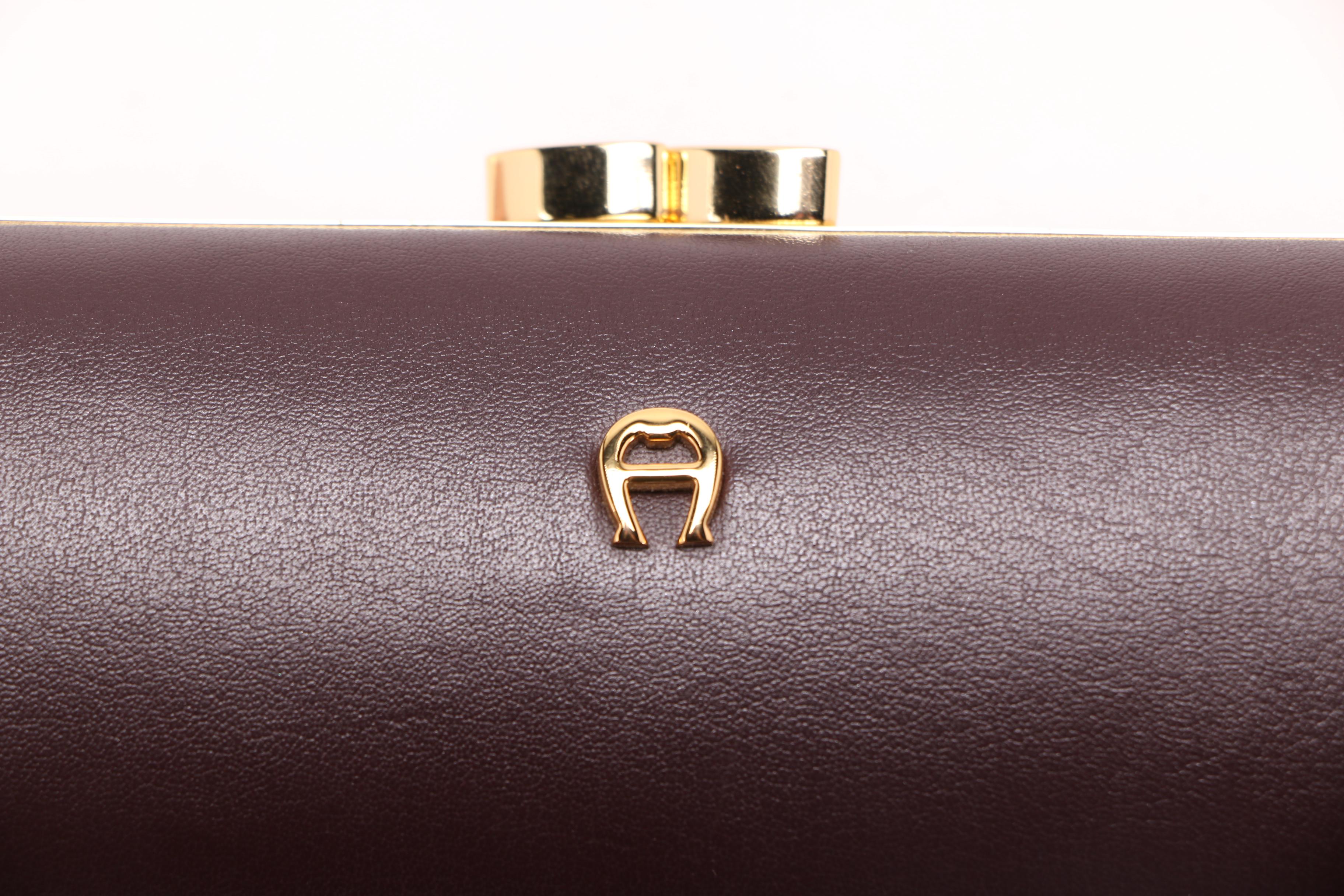 Tory Burch and Étienne Aigner Glasses Cases