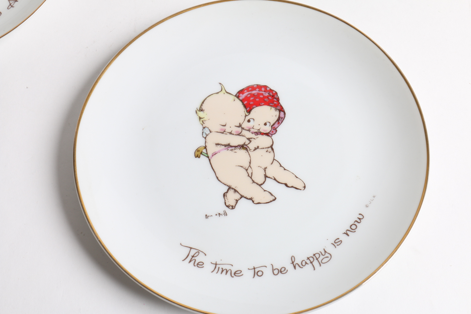 Kewpie Collector's Plates and a Candy Dish