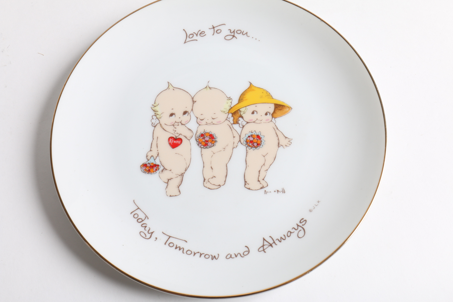 Kewpie Collector's Plates and a Candy Dish