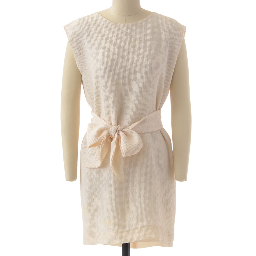 Catherine Regehr of Vancouver, British Columbia Ivory Sleeveless Shift Dress with Tie Belt