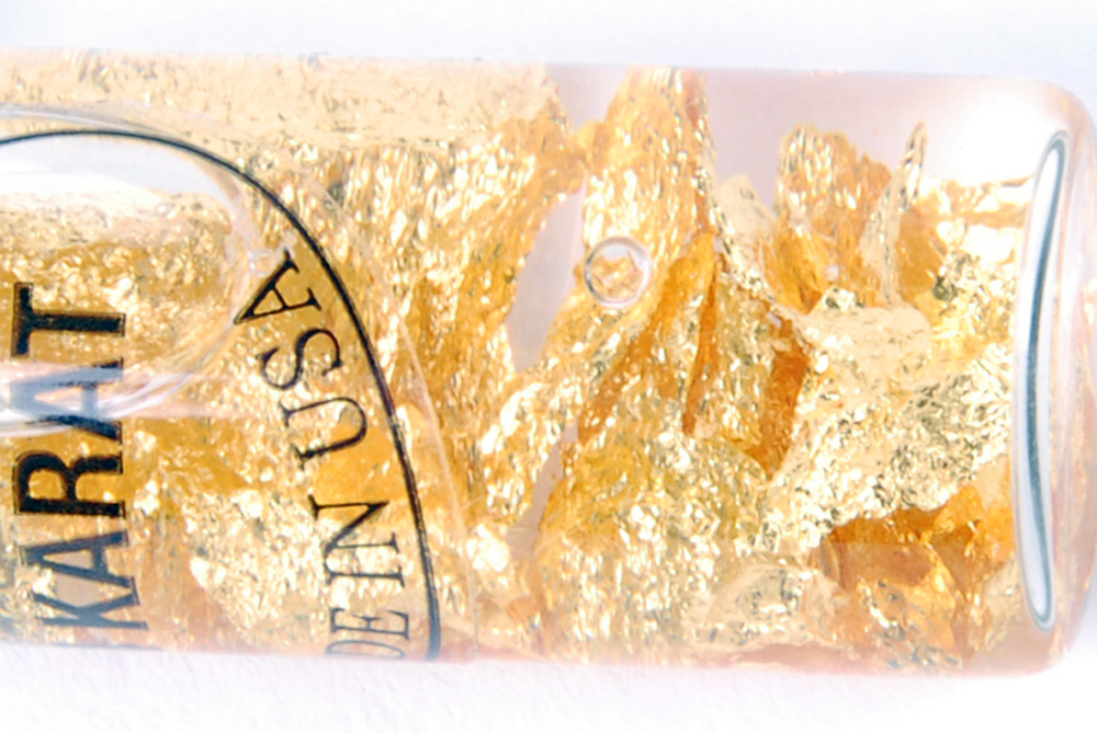 Vial Marked 24K Pure Gold Flakes