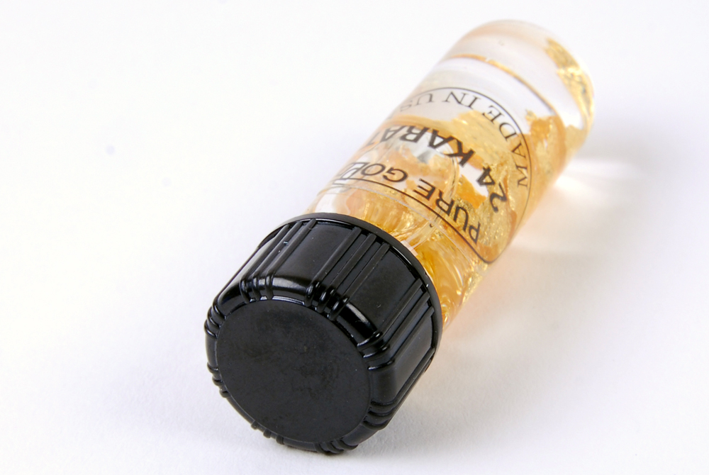 Vial Marked 24K Pure Gold Flakes