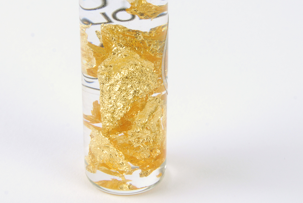 Vial Marked 24K Pure Gold Flakes
