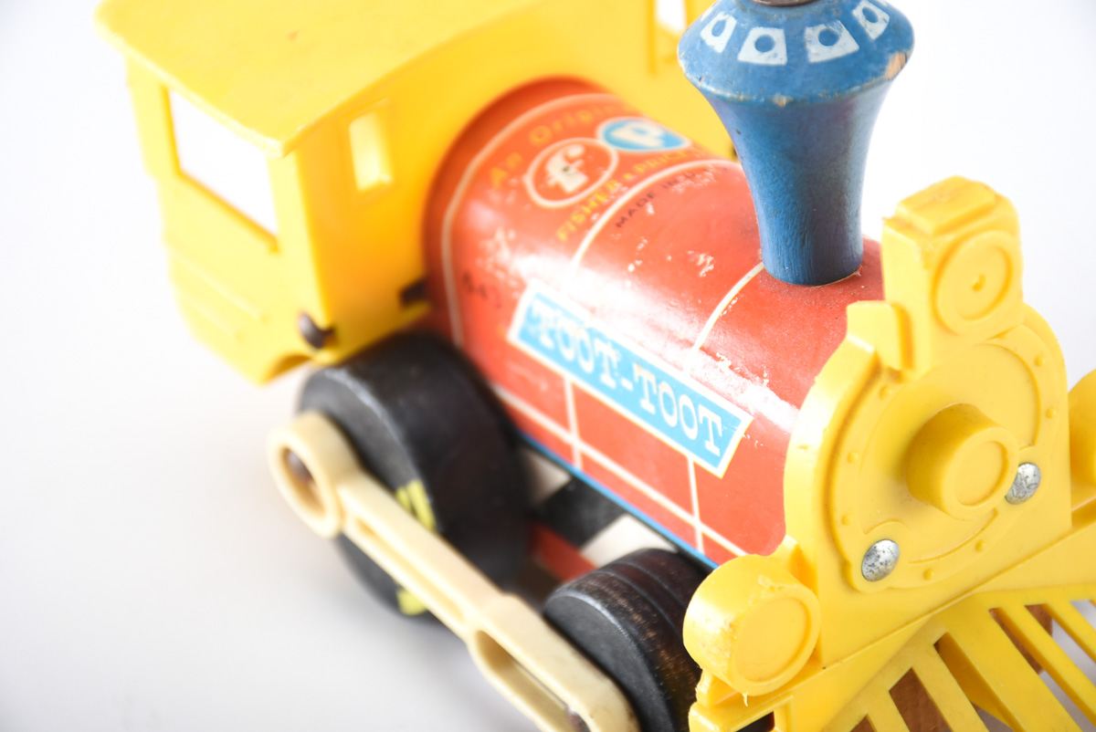 Vintage Plastic and Metal Toys Featuring Fischer Price