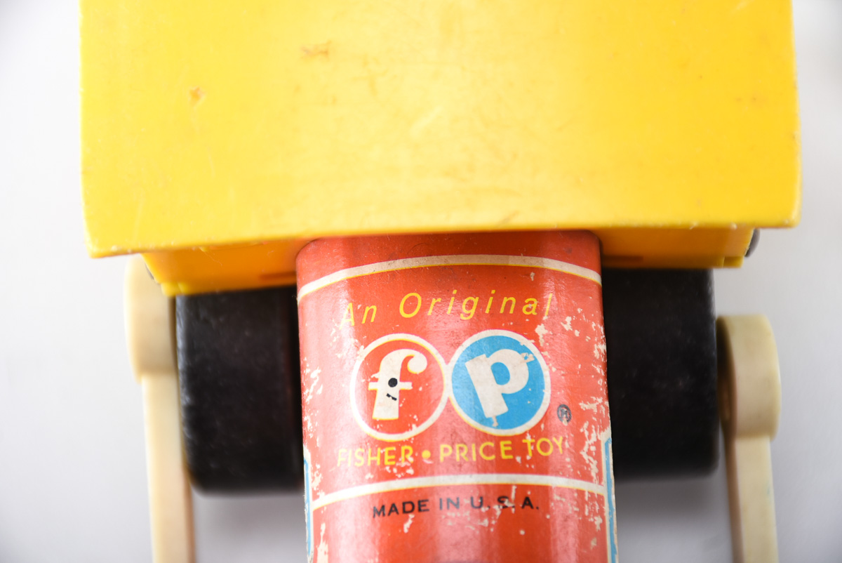 Vintage Plastic and Metal Toys Featuring Fischer Price