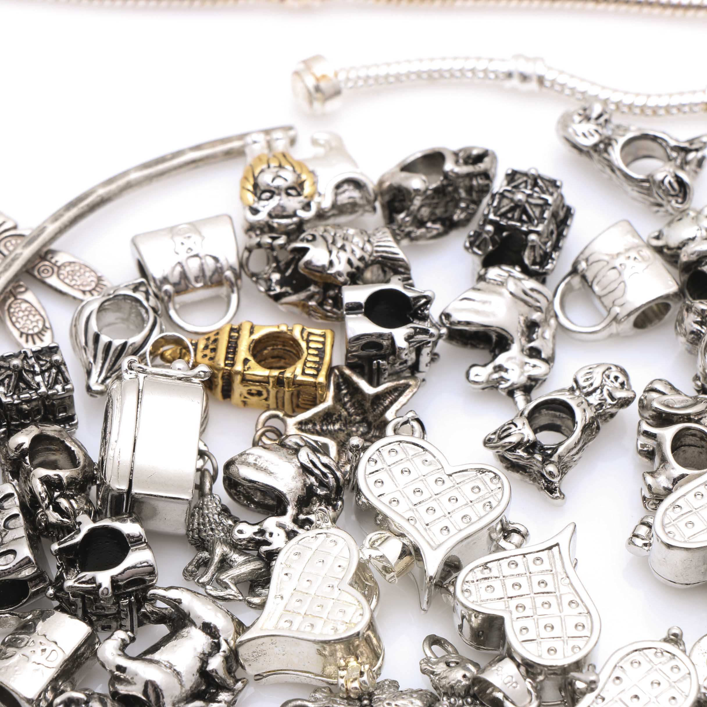 Large Assortment of Metal Beads and Charms