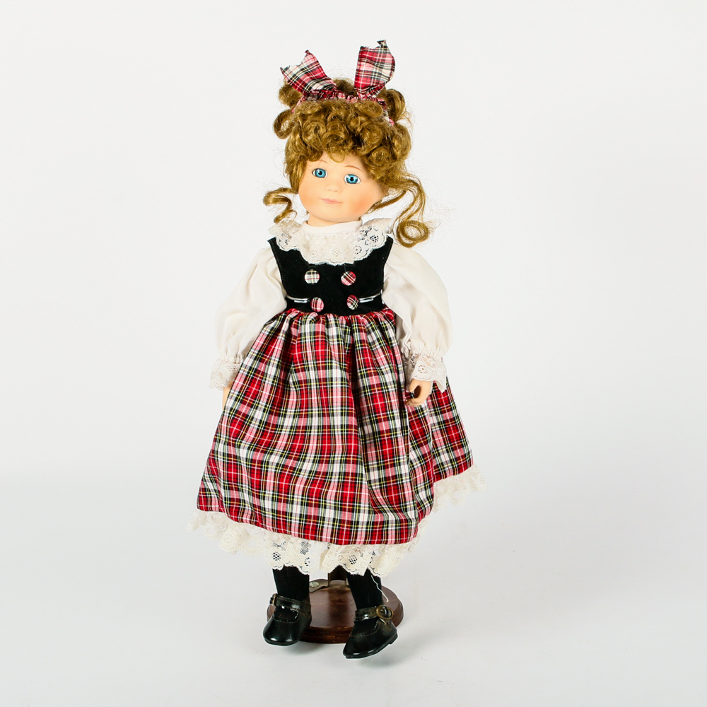 Porcelain Doll in Tartan Dress