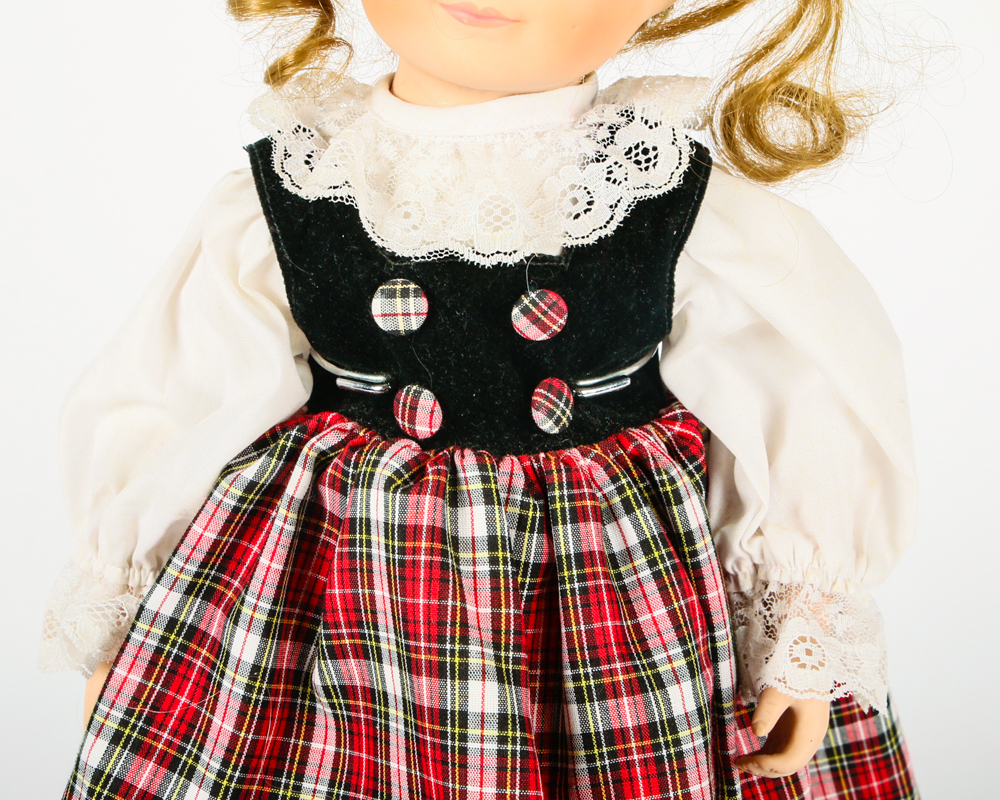 Porcelain Doll in Tartan Dress