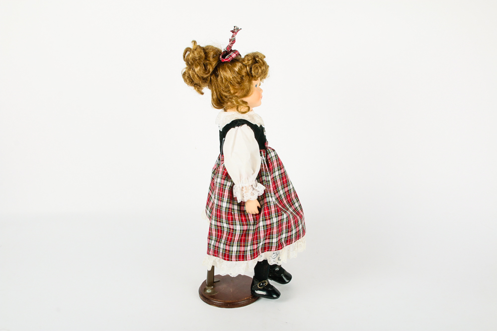 Porcelain Doll in Tartan Dress