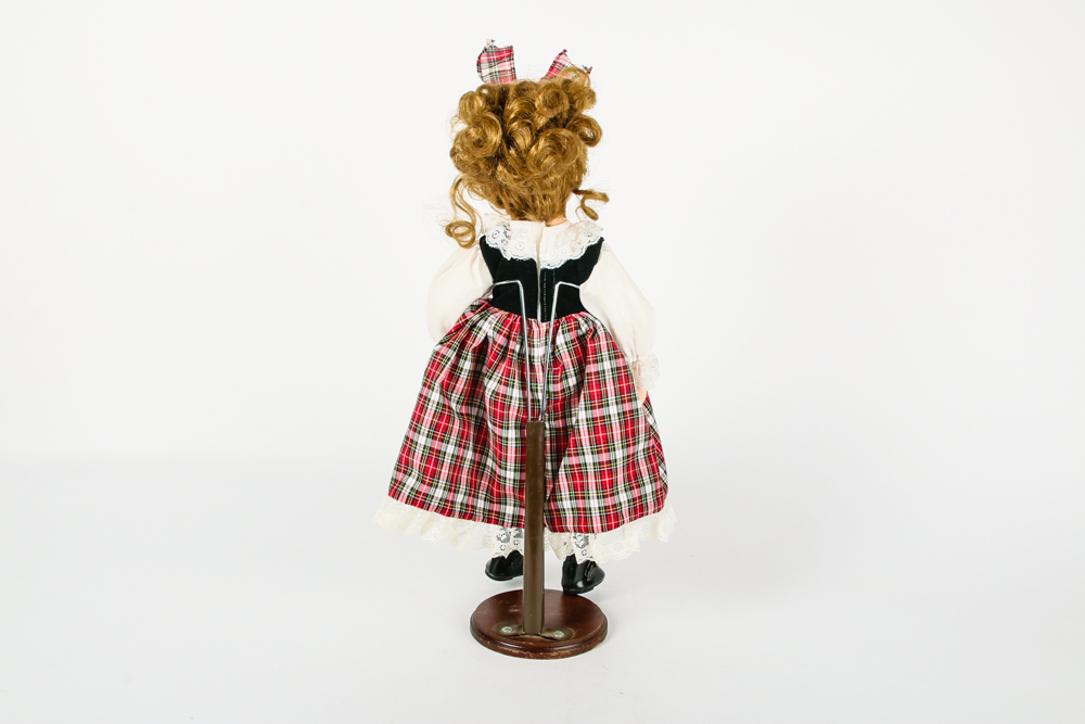Porcelain Doll in Tartan Dress