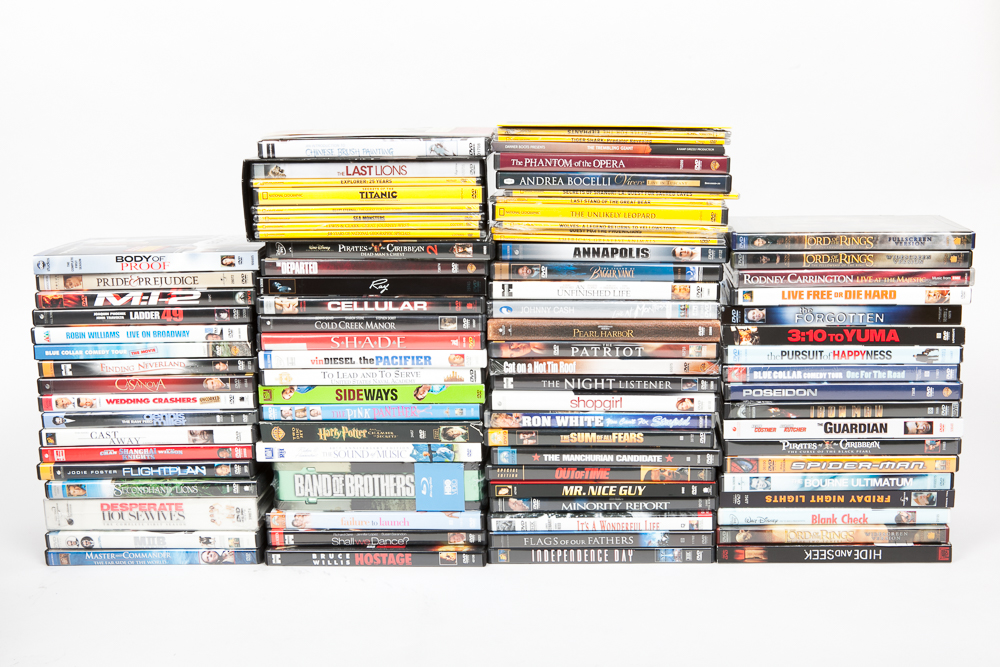 Toshiba 13" Television/DVD Player and 75 DVDs/Blu-ray Discs