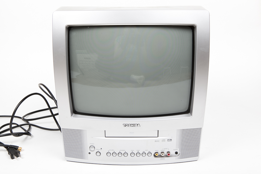 Toshiba 13" Television/DVD Player and 75 DVDs/Blu-ray Discs