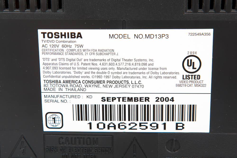 Toshiba 13" Television/DVD Player and 75 DVDs/Blu-ray Discs