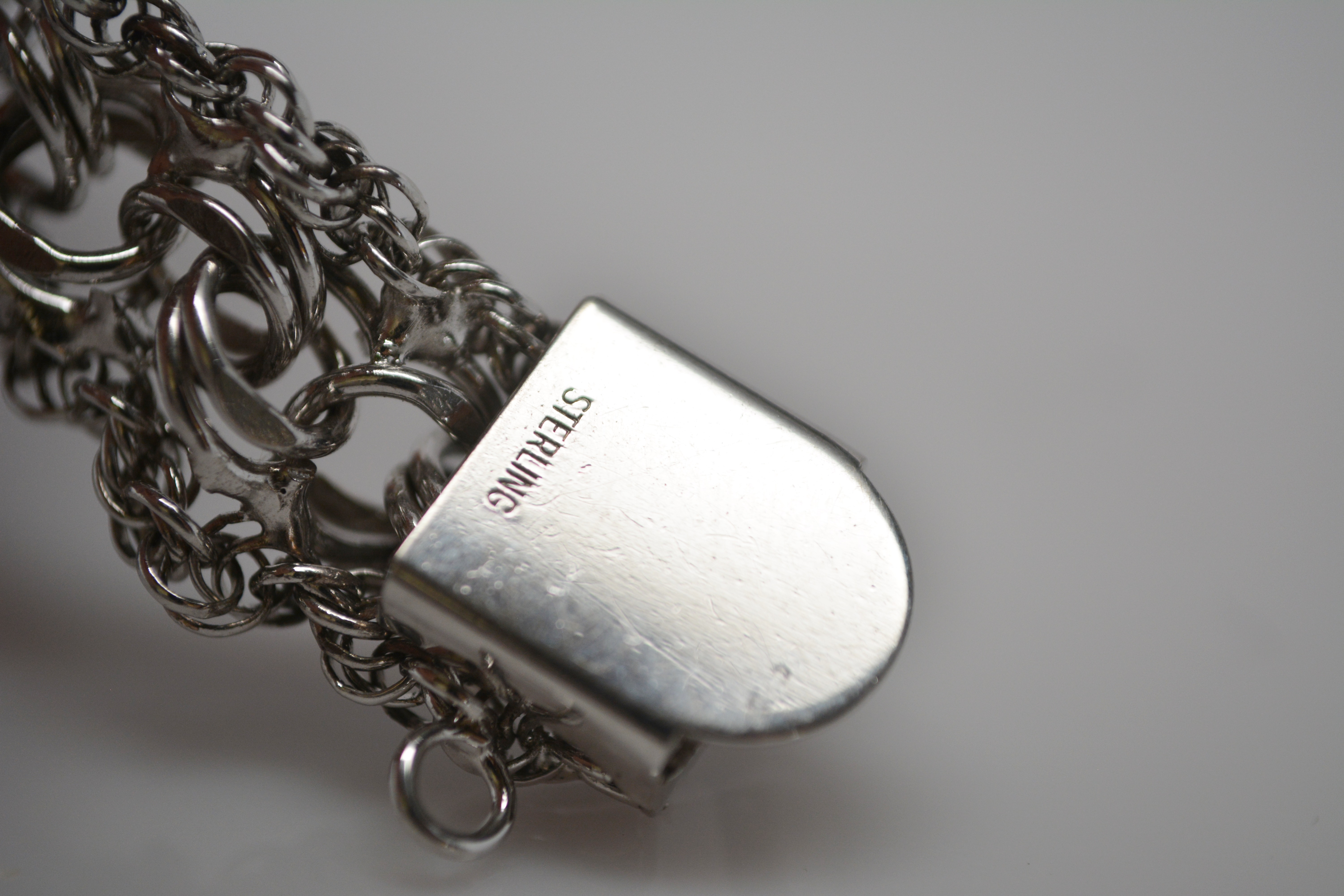 Sterling Silver Multiple Chain Charm Bracelet