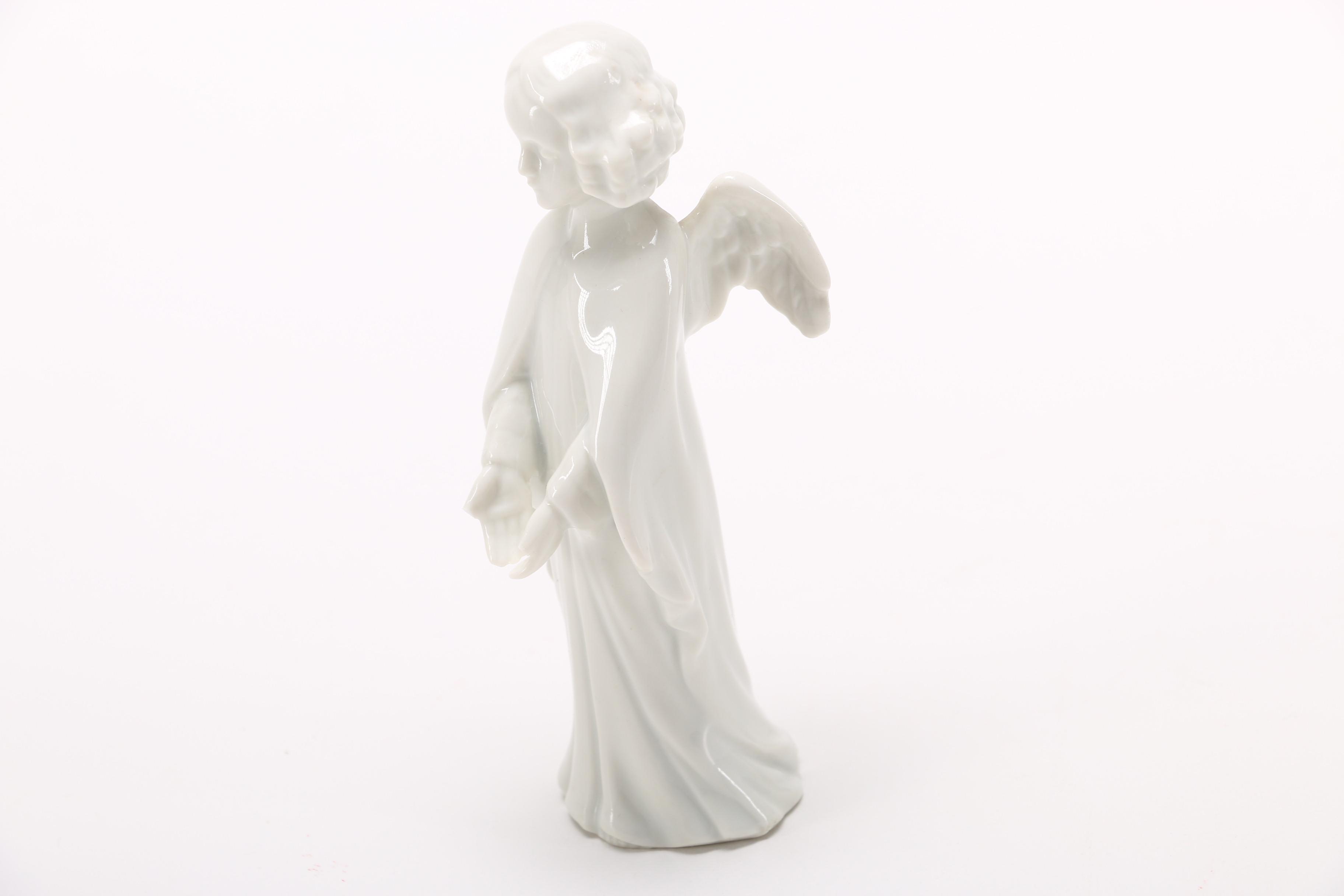 Group of German White Porcelain Angel Figurines