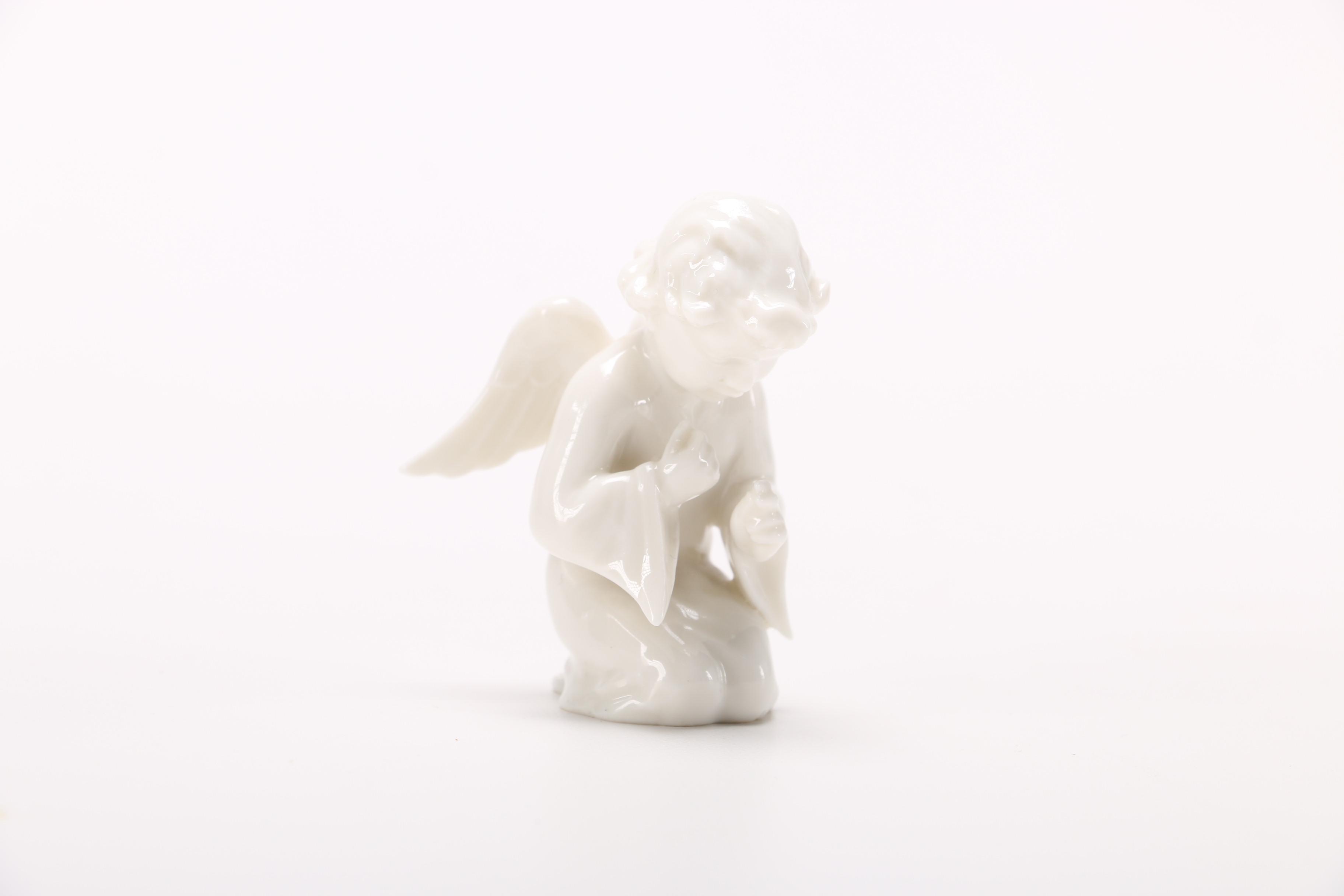 Group of German White Porcelain Angel Figurines