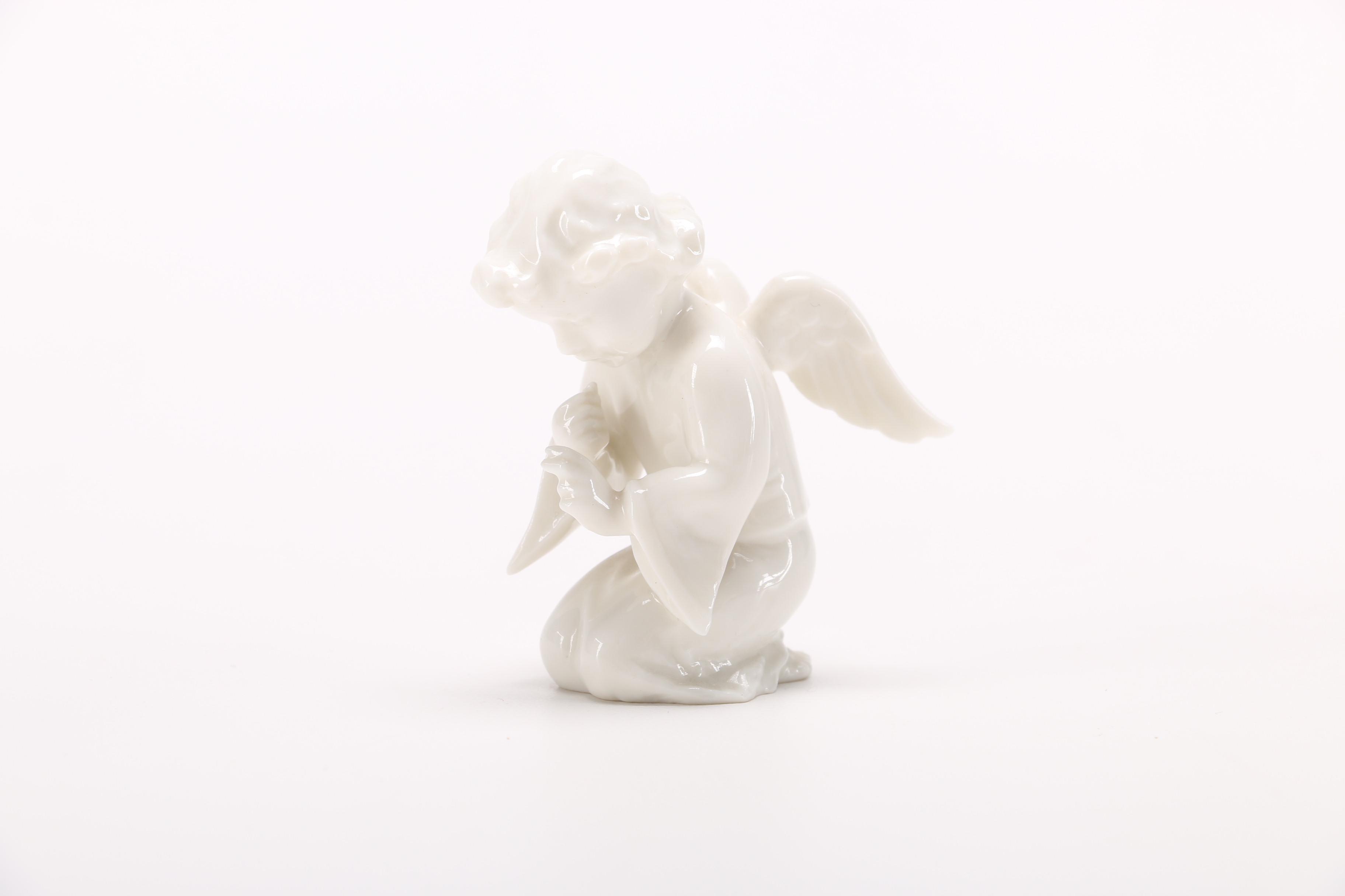 Group of German White Porcelain Angel Figurines