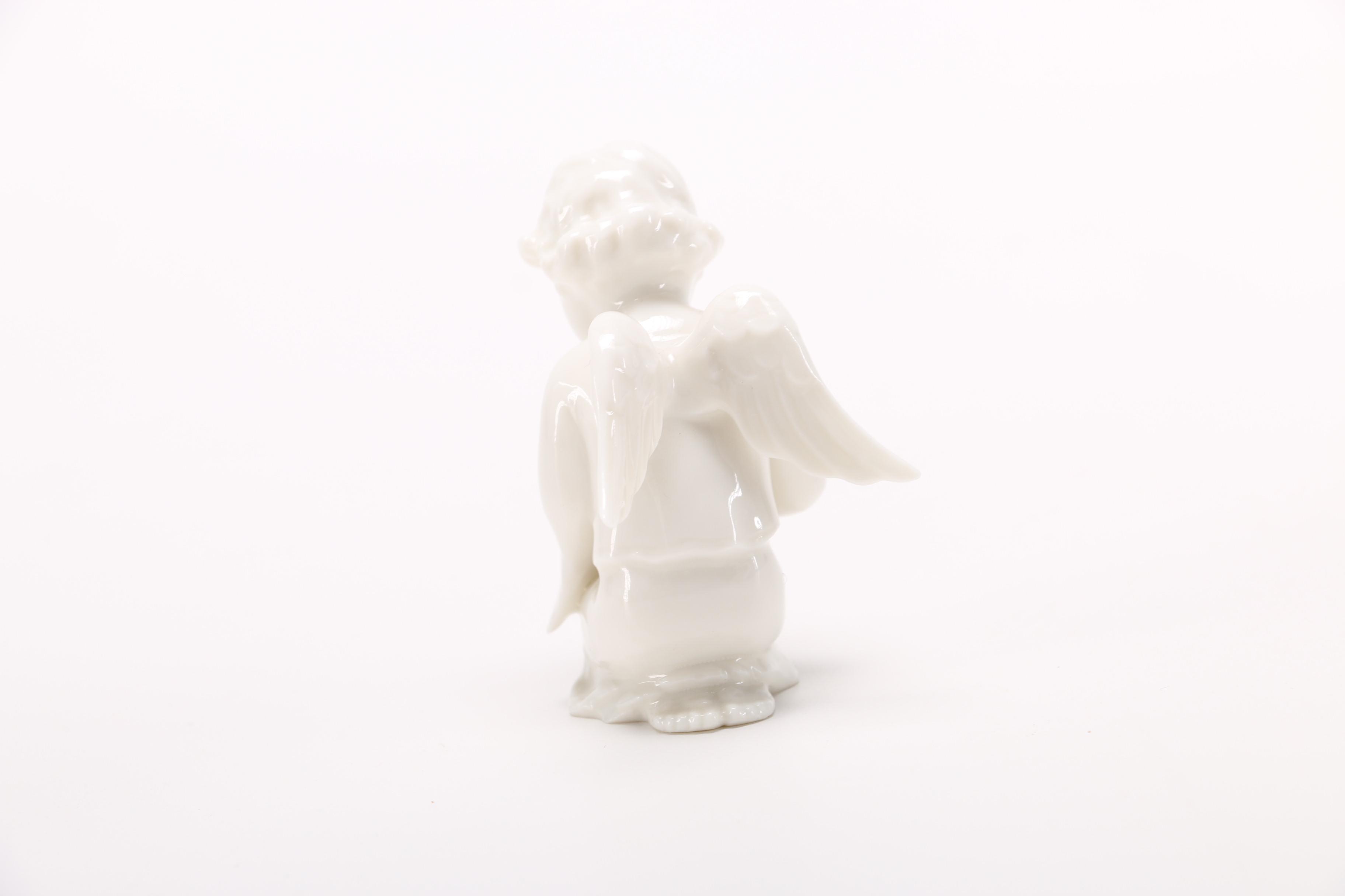 Group of German White Porcelain Angel Figurines