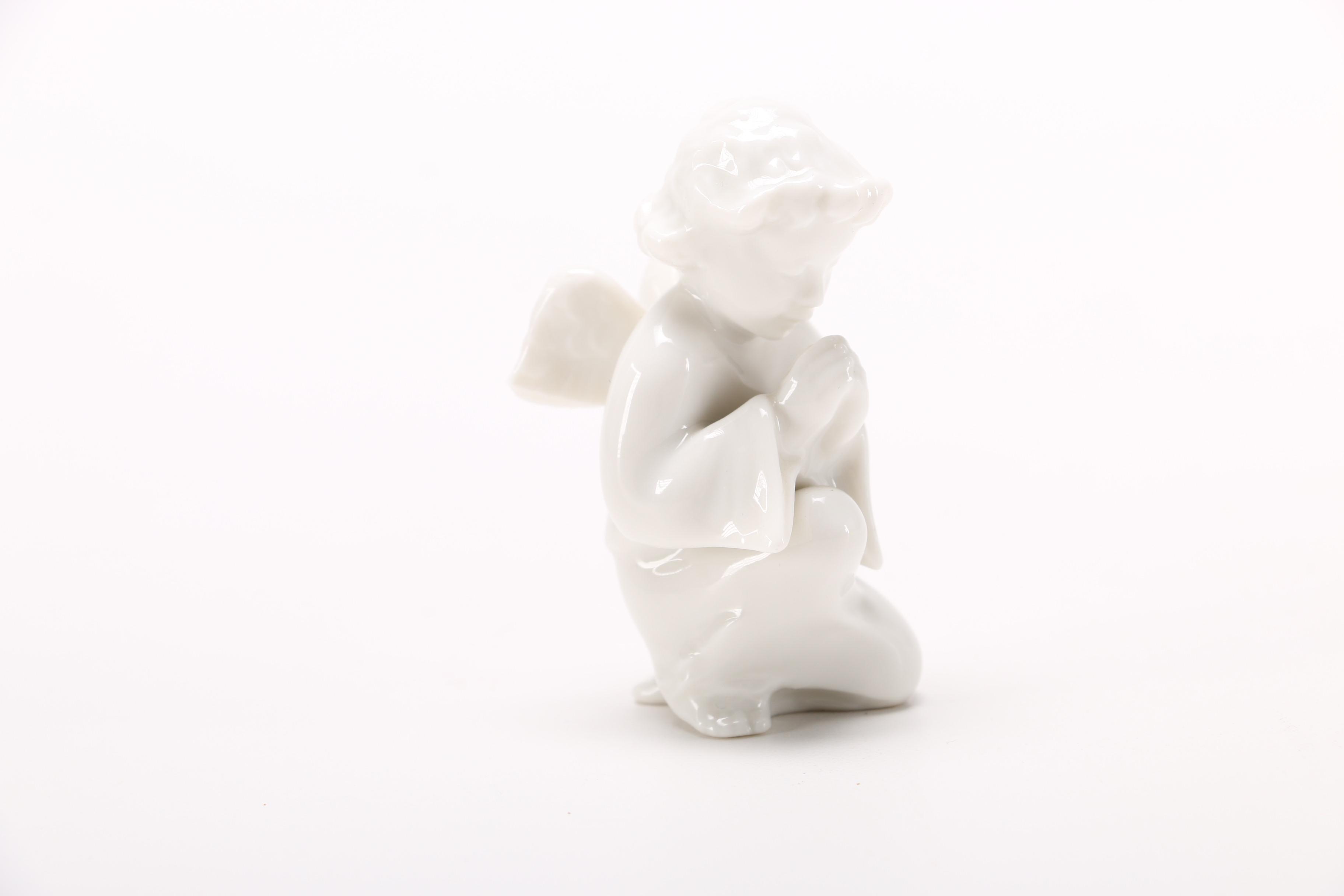 Group of German White Porcelain Angel Figurines