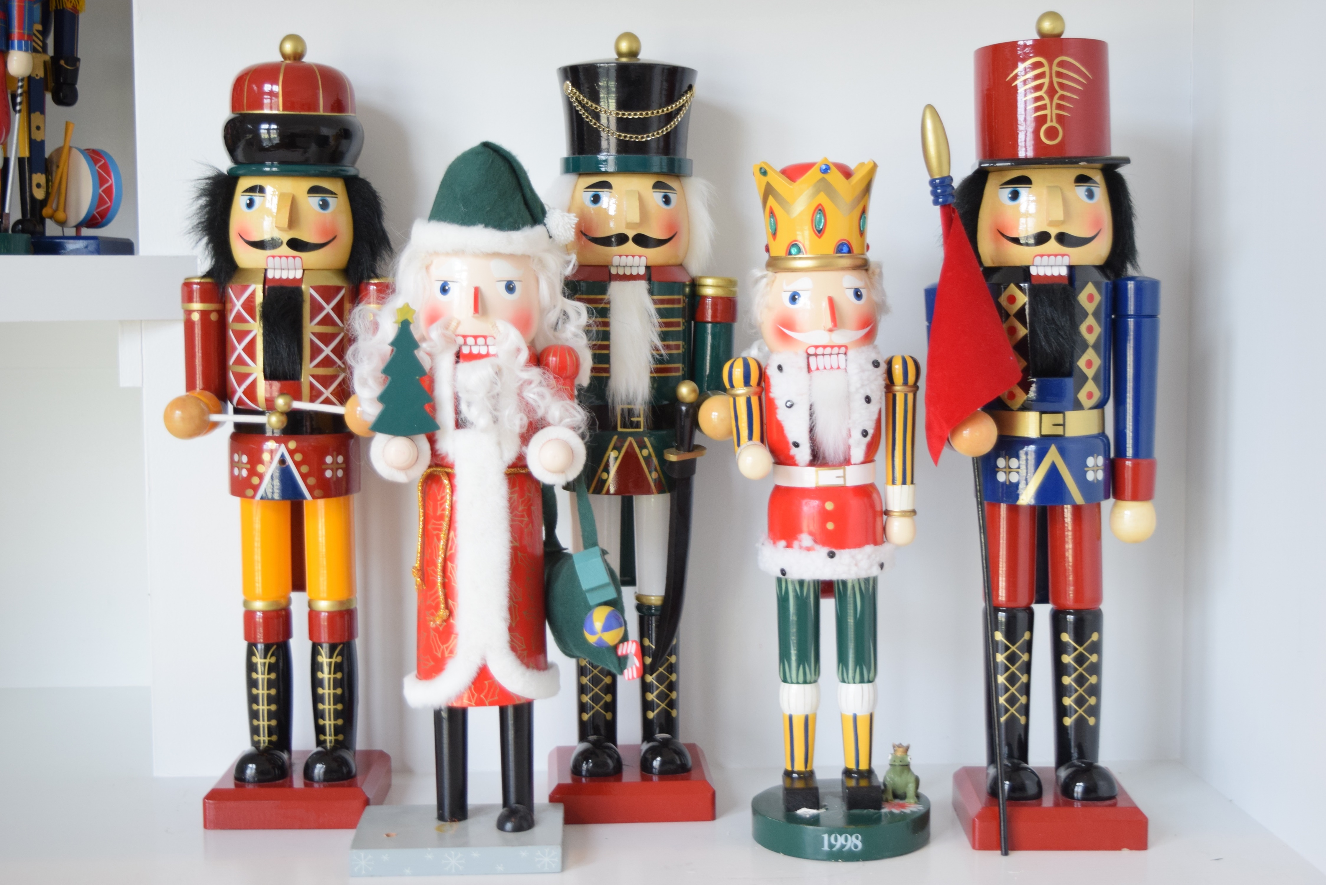 An Assortment of Sixteen Wooden Nutcrackers in Various Sizes