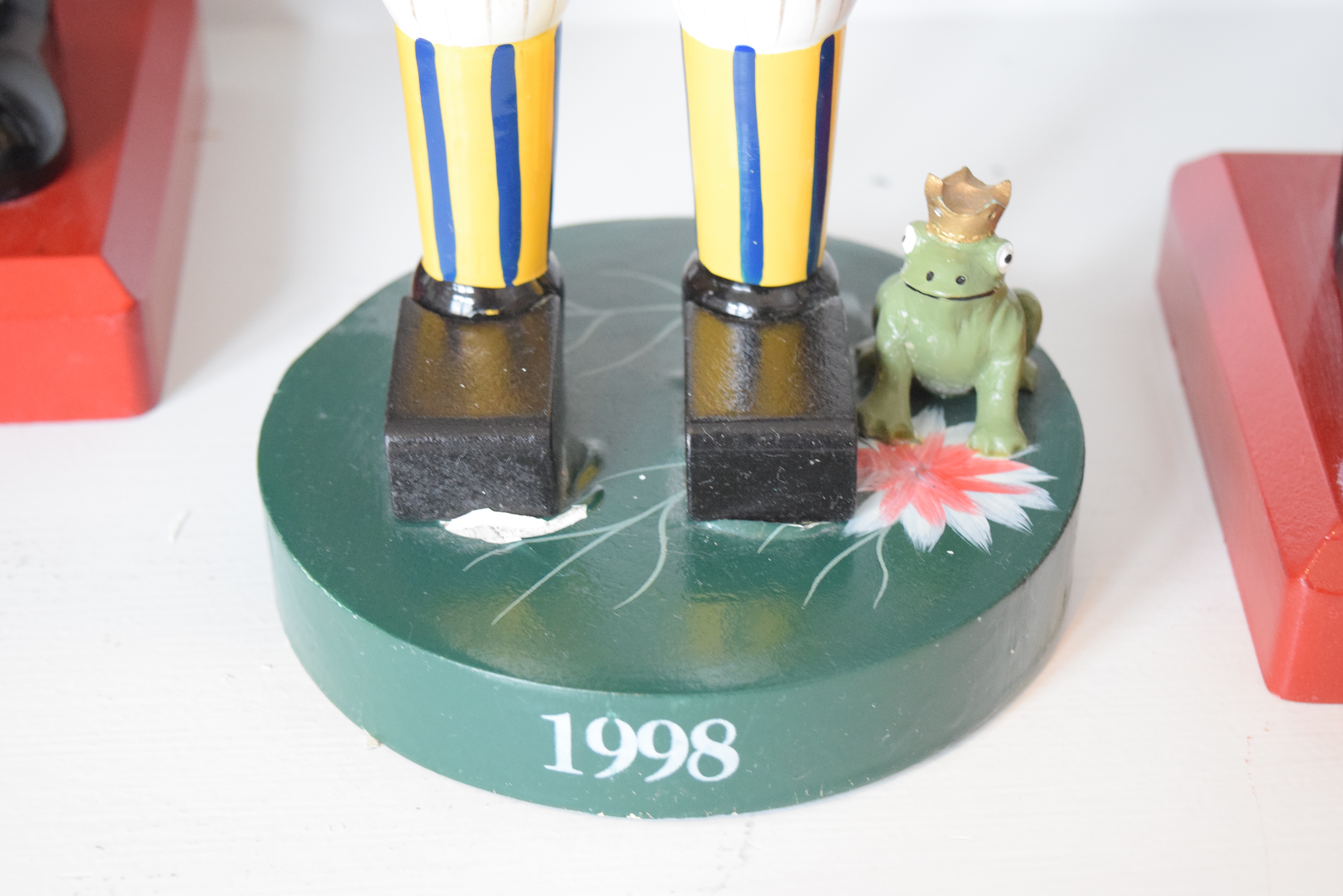 An Assortment of Sixteen Wooden Nutcrackers in Various Sizes