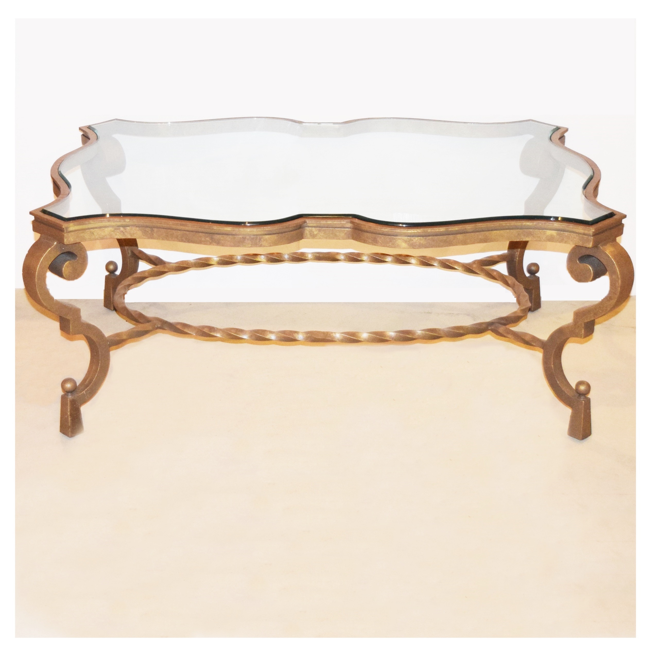 Elegant Glass Top Coffee Table with Antiqued Gold Metal Base