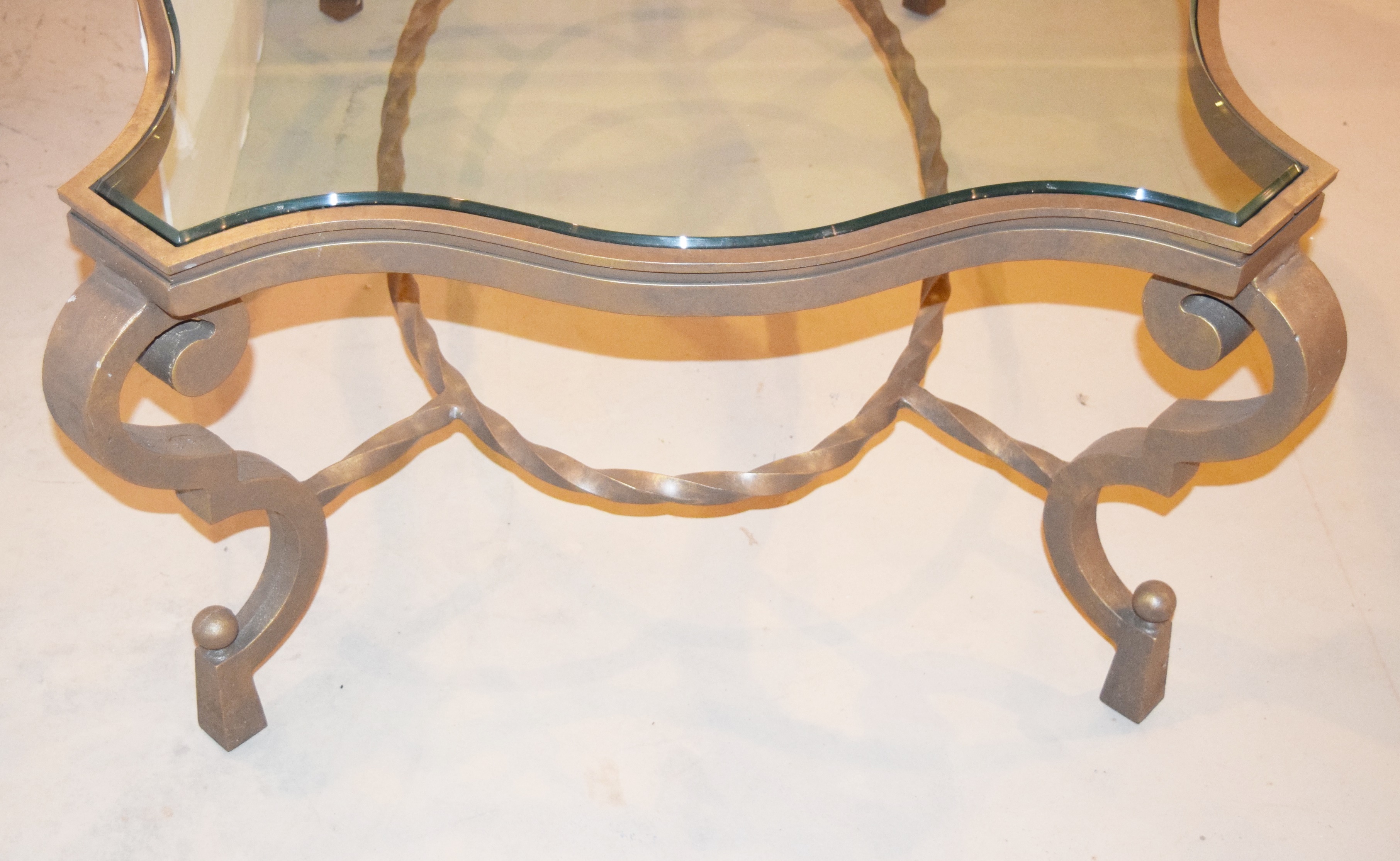 Elegant Glass Top Coffee Table with Antiqued Gold Metal Base