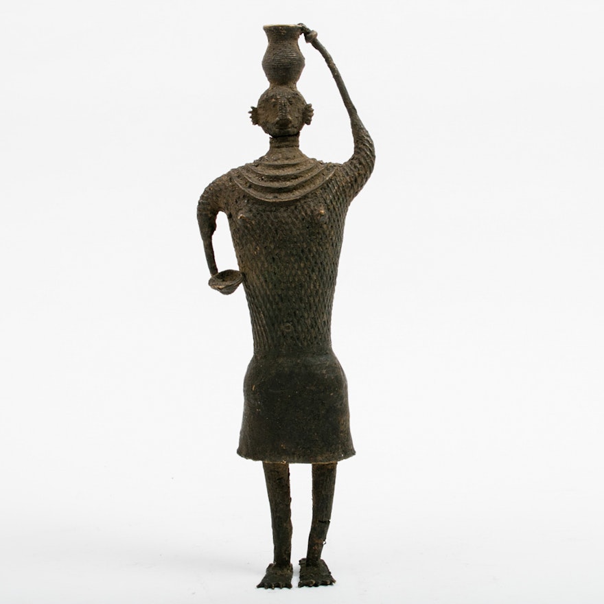 Primitive Cast Metal Statue