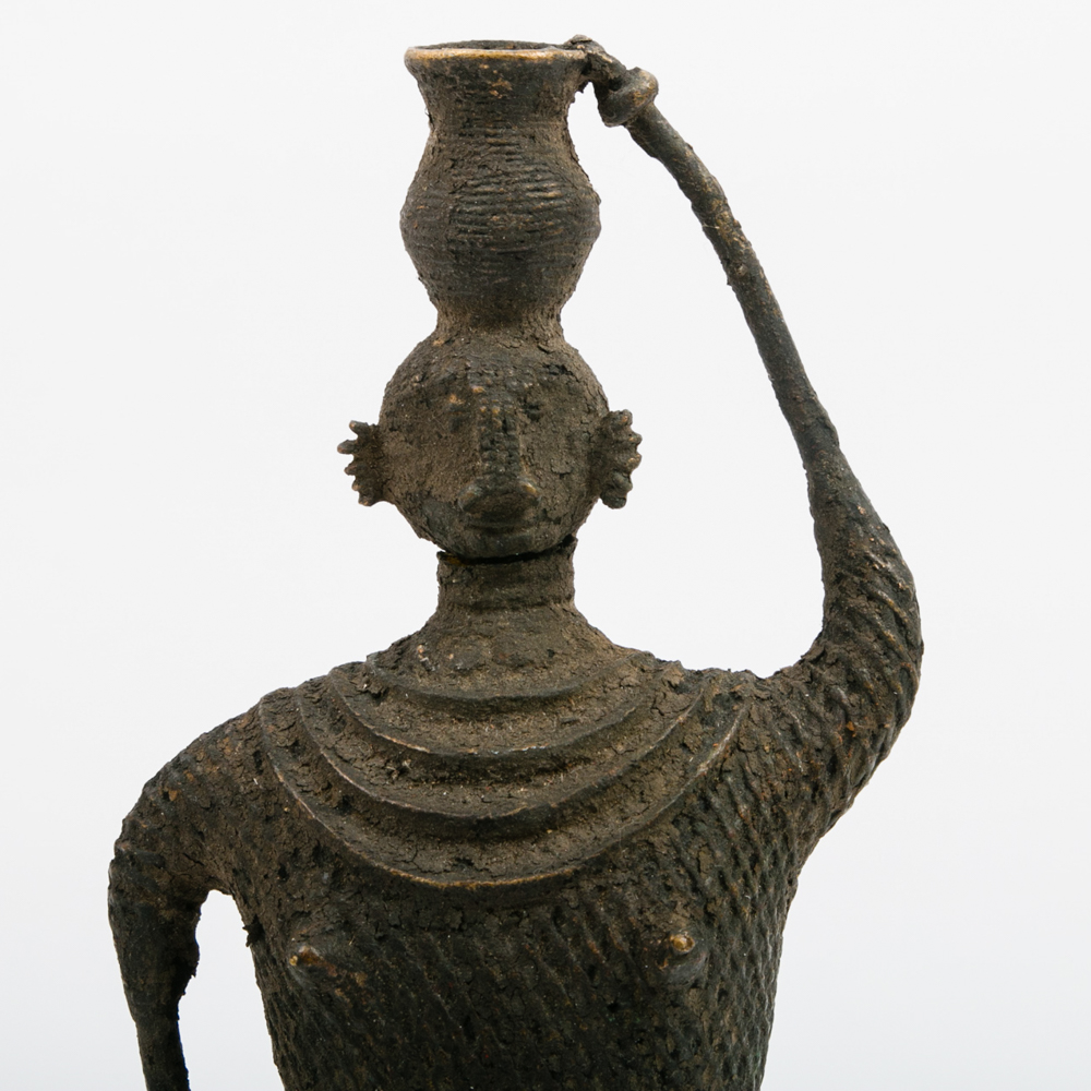 Primitive Cast Metal Statue