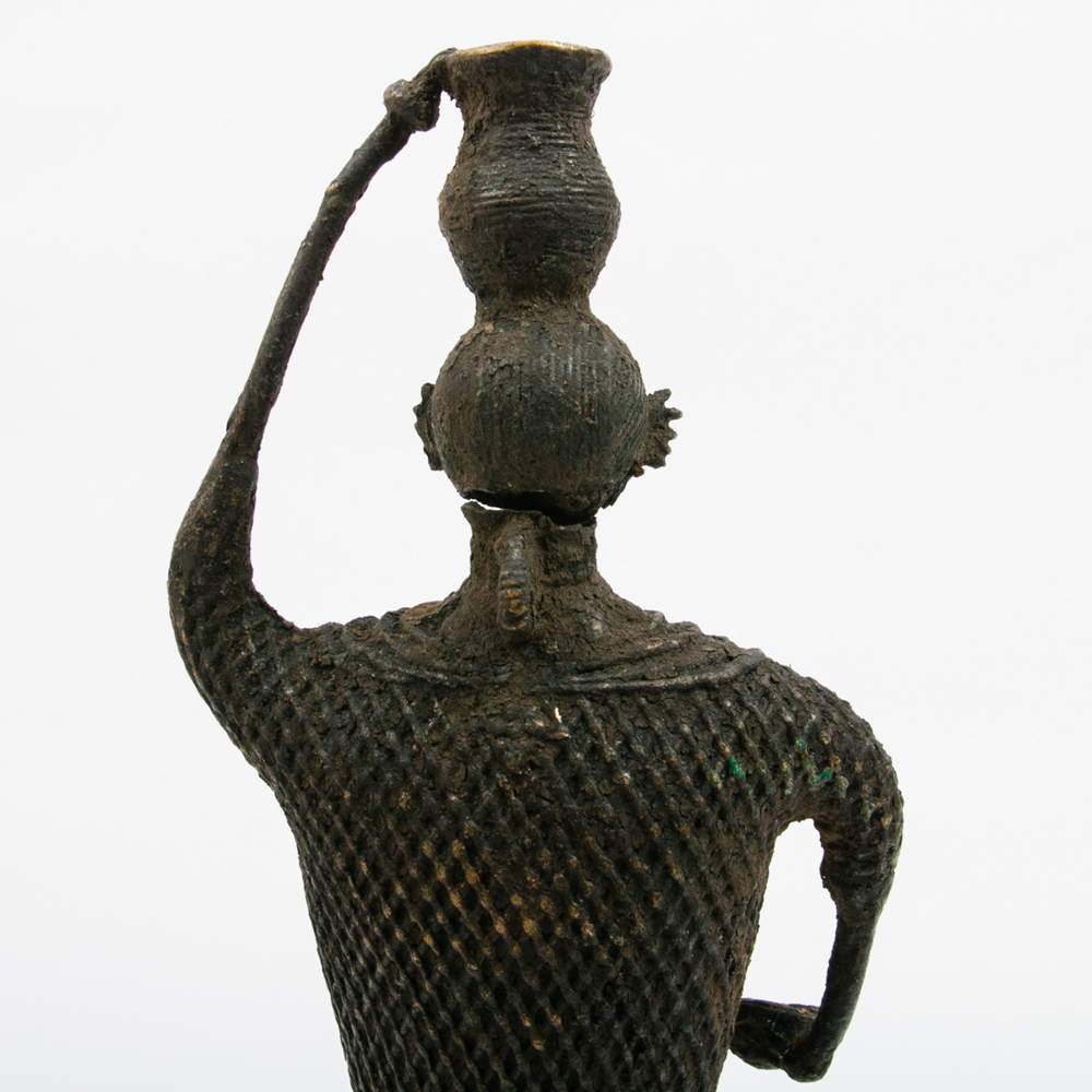 Primitive Cast Metal Statue