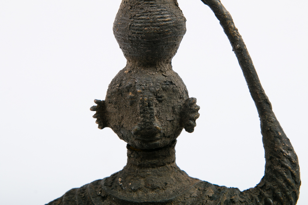 Primitive Cast Metal Statue